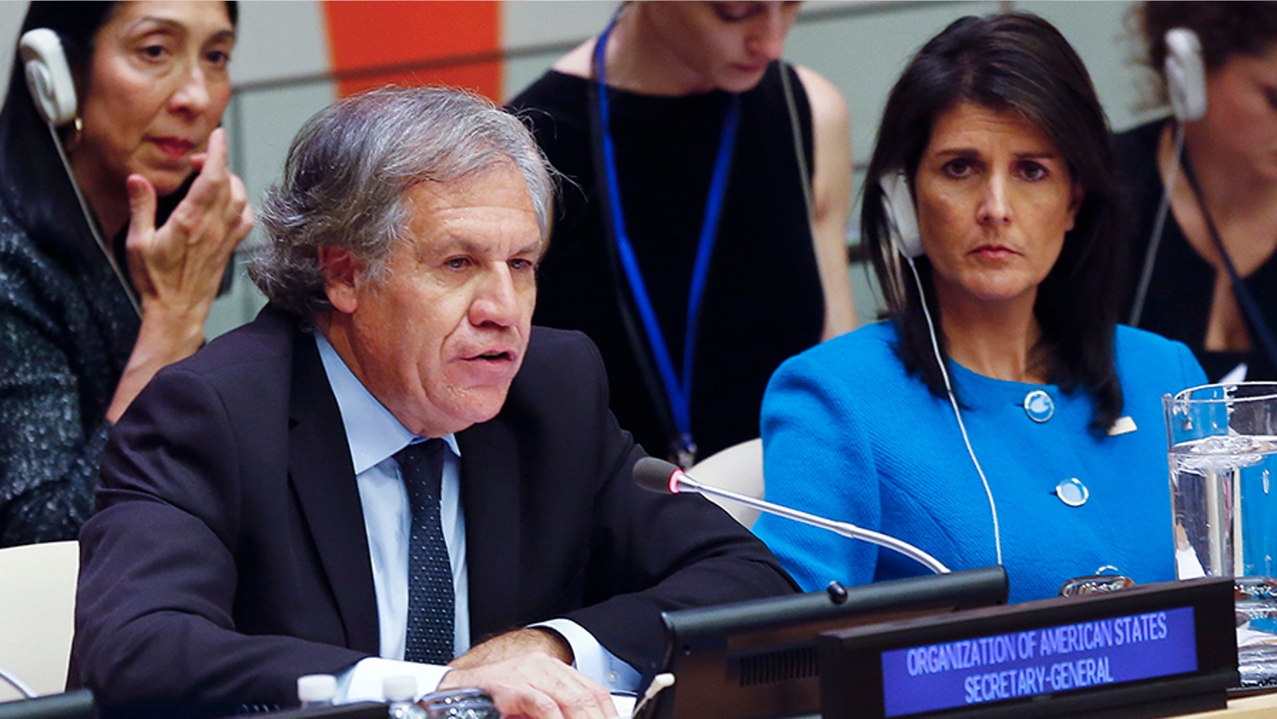 United Nations U.S. Ambassador Nikki Haley, right, listens as Organization of American States Secretary General Luis Almargo speaks during a U.N. meeting on human rights concerns in Venezuela, Monday Nov. 13, 2017 at U.N. headquarters.