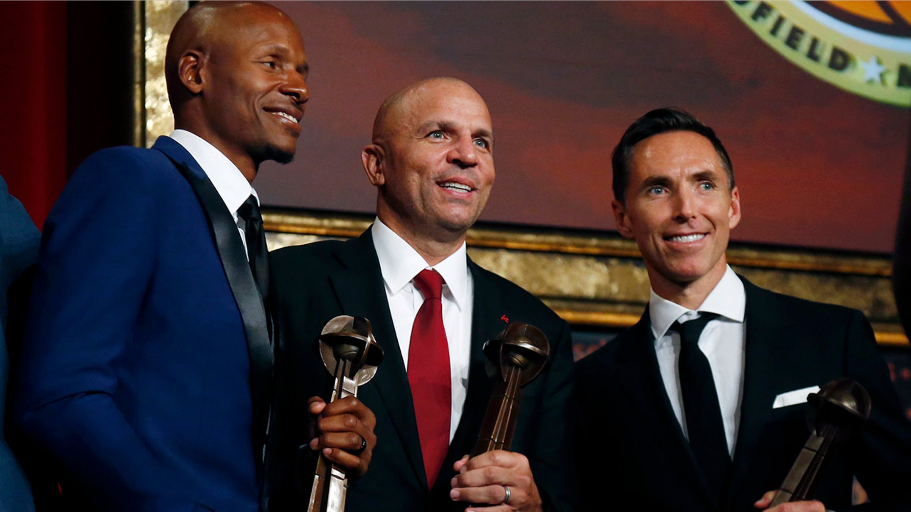 Retired NBA players Ray Allen, Jason Kidd and Steve Nash, from left, pose for a photo after induction ceremonies at the Basketball Hall of Fame, in Springfield, Mass., Sept. 7, 2018.