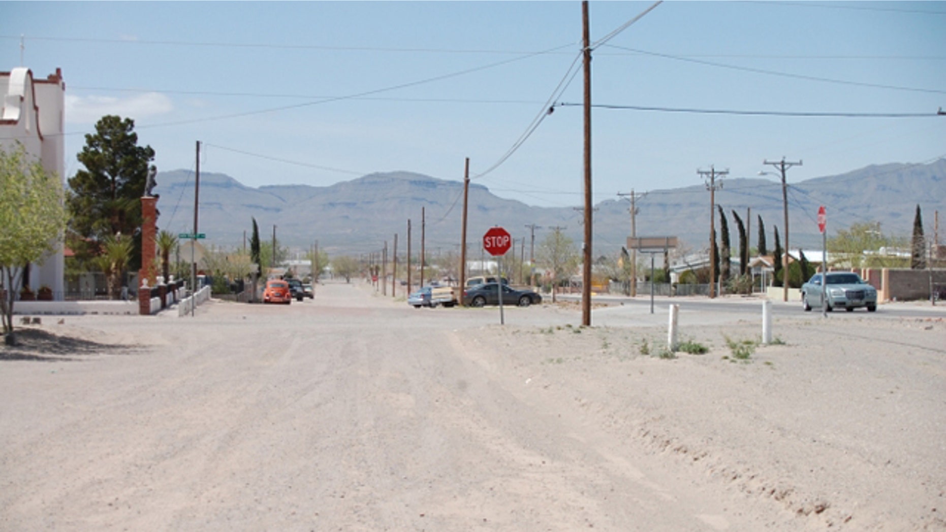 April 2, 2010: A street in Fort Hancock, Texas, roughly 25 miles west of Fort Quitman, where four Hudspeth County employees were working on a remote, unpaved road when an unknown gunman fired from across the Rio Grande at about 10:30 a.m. Thursday. Mexico can be seen in the background. (FoxNews.com/Joshua Rhett Miller)