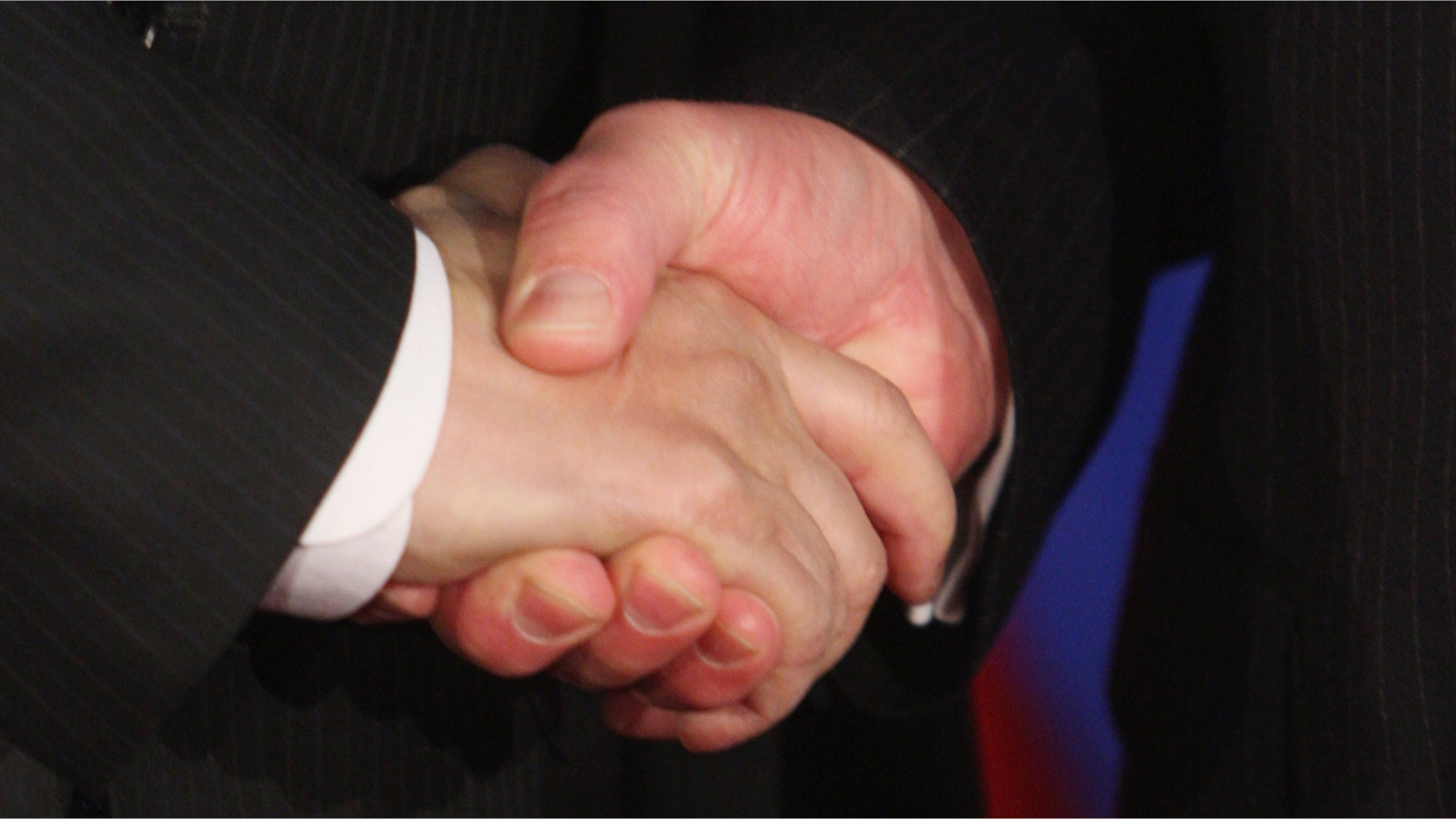 BERLIN - JANUARY 22: Foreign Minister Frank-Walter Steinmeier (R) and Chinese Foreign Minister Yang Jiechi shake hands after speaking to the media after bilateral talks on January 22, 2008 in Berlin, Germany. The two men met ahead of a meeting of the foreign ministers of Germany, China, the USA, Russia, Britain and France to discuss the Iranian nuclear program. Germany and China slid into chilly relations after Chancellor Merkel received the Dalai Lama last year in the Chancellery, though in recent weeks China has made announcements that have thawed the two countries' relationship. (Photo by Sean Gallup/Getty Images)