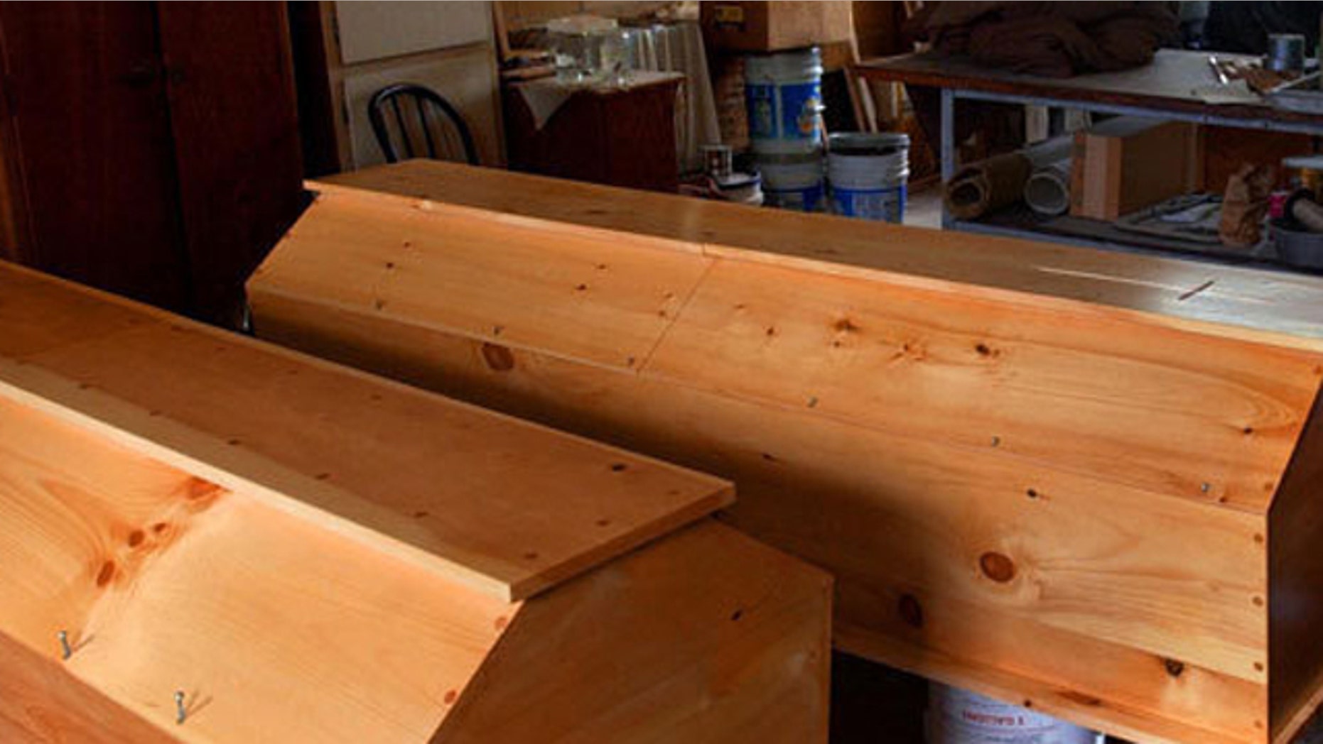 The monks make handcrafted caskets like these pictured.