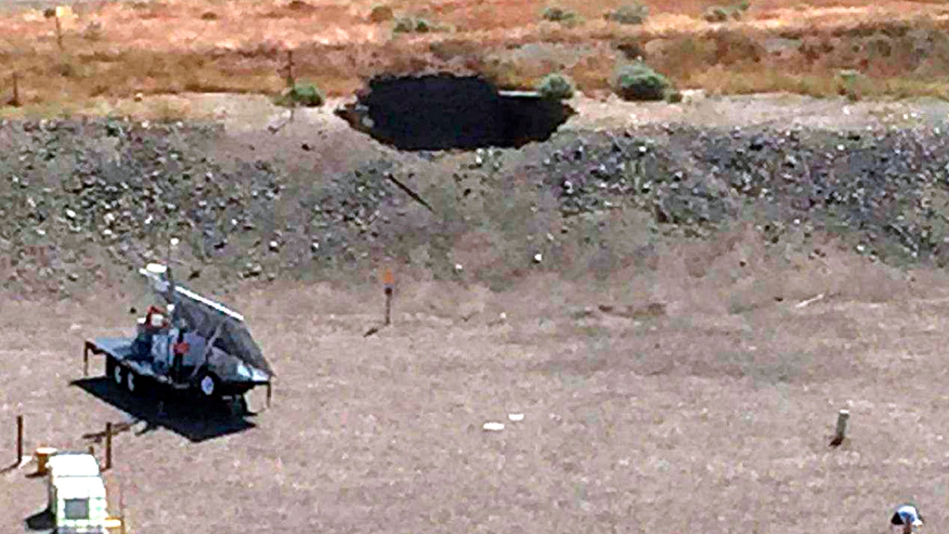 This image provided by the U.S. Department of Energy shows a 20-foot by 20-foot hole in the roof of a storage tunnel at the Hanford Nuclear Reservation near Richland, Wash.