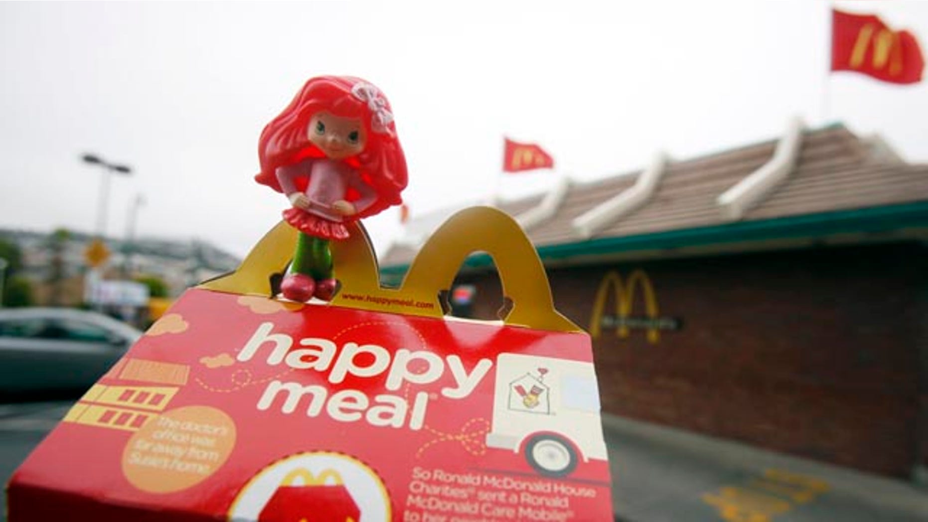 A Happy Meal box and toy are shown outside of a McDonald's restaurant in San Francisco. San Francisco has become the first major American city to prohibit fast-food restaurants from including toys with children's meals that do not meet nutritional guidelines.