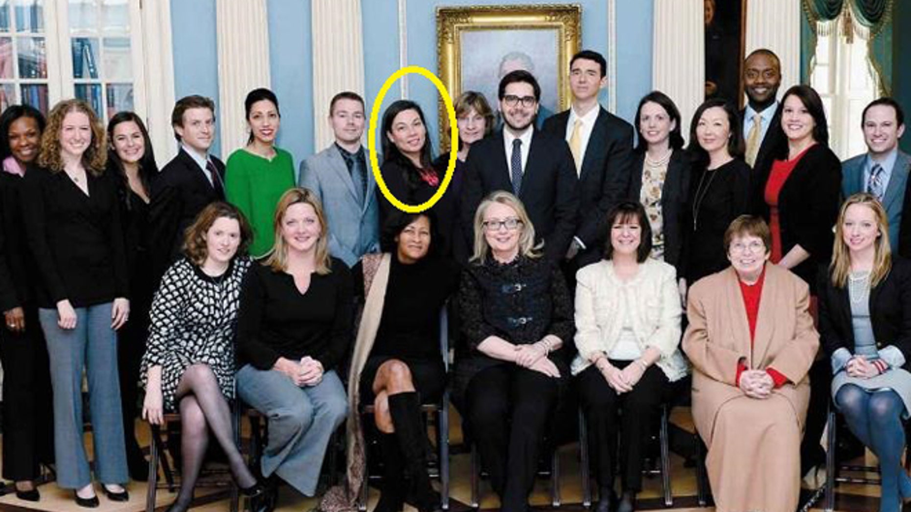Monica Hanley, pictured standing in the back row right behind Hillary Clinton aide Cheryl Mills in a State Department photo from Clinton's book "Hard Choices."