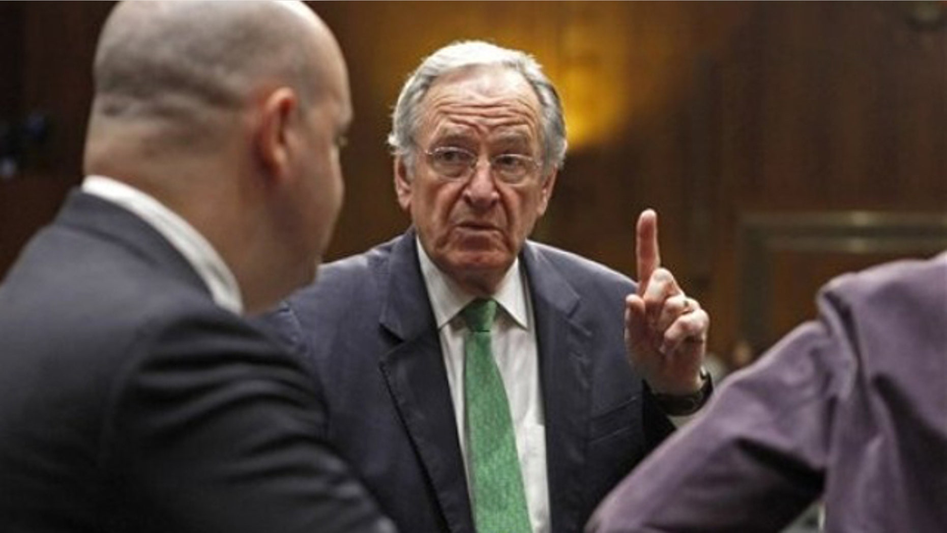 Oct. 19, 2011: Sen. Tom Harkin speaks to a staff member on Capitol Hill in Washington.