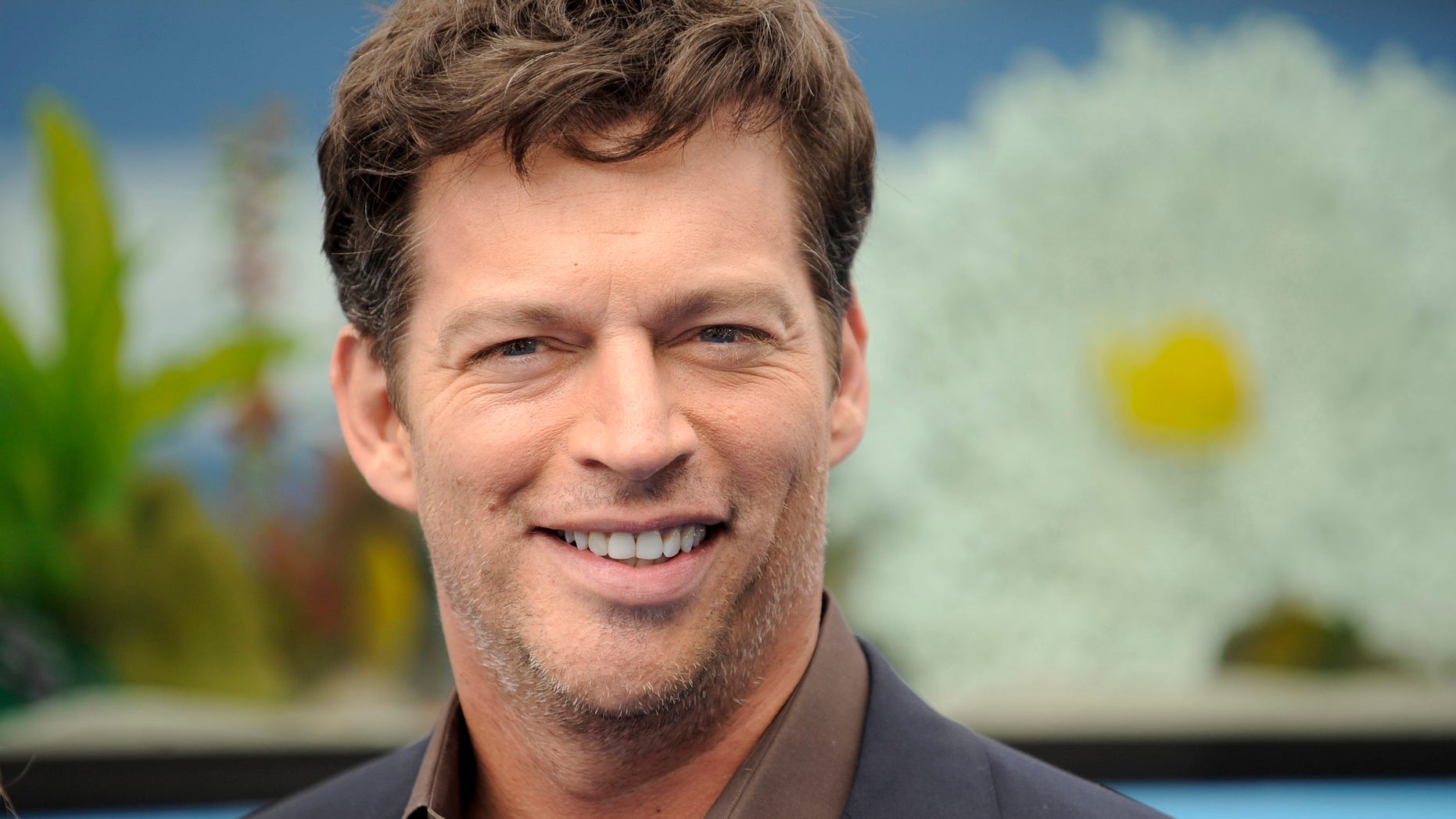 Actor Harry Connick Jr. arrives at the movie "Dolphin Tale" world premiere in Los Angeles, California September 17, 2011. REUTERS/Gus Ruelas (UNITED STATES - Tags: ENTERTAINMENT) - RTR2RGNU