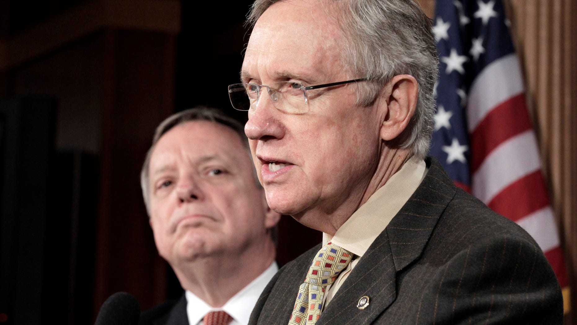 June 30, 2011: Senate Majority Leader Harry Reid, accompanied by Senate Majority Whip Richard Durbin, speaks to reporters on Capitol Hill in Washington.
