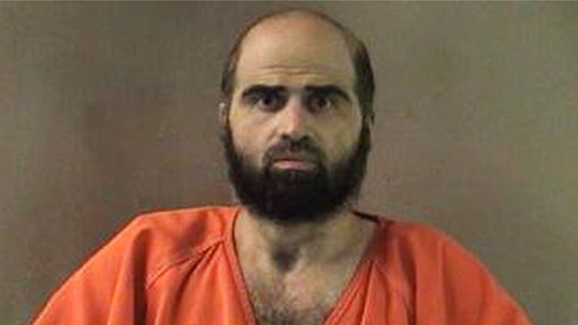 This undated file photo provided by the Bell County Sheriff's Department shows Nidal Hasan.
