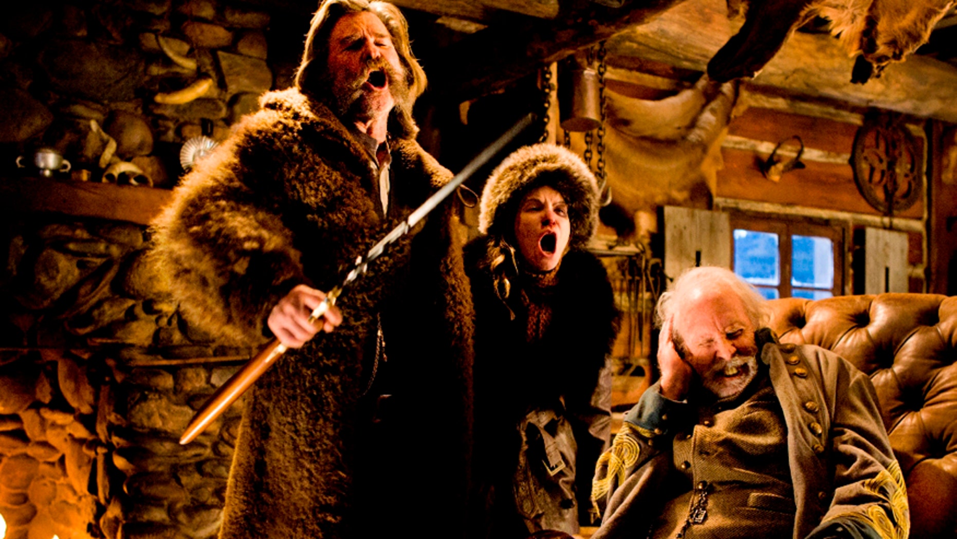 This image released by The Weinstein Company shows Kurt Russell, from left, Jennifer Jason Leigh and Bruce Dern in a scene from the film, "The Hateful Eight."