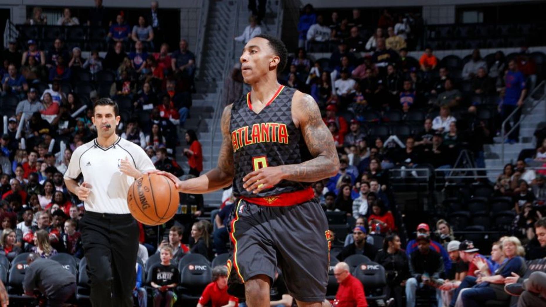 AUBURN HILLS, MI - MARCH 26: Jeff Teague #0 of the Atlanta Hawks drives against the Detroit Pistons during the game on March 26, 2016 at The Palace of Auburn Hills in Auburn Hills, Michigan. NOTE TO USER: User expressly acknowledges and agrees that, by downloading and or using this Photograph, user is consenting to the terms and conditions of the Getty Images License Agreement. Mandatory Copyright Notice: Copyright 2016 NBAE (Photo by B. Sevald/Einstein/NBAE via Getty Images)