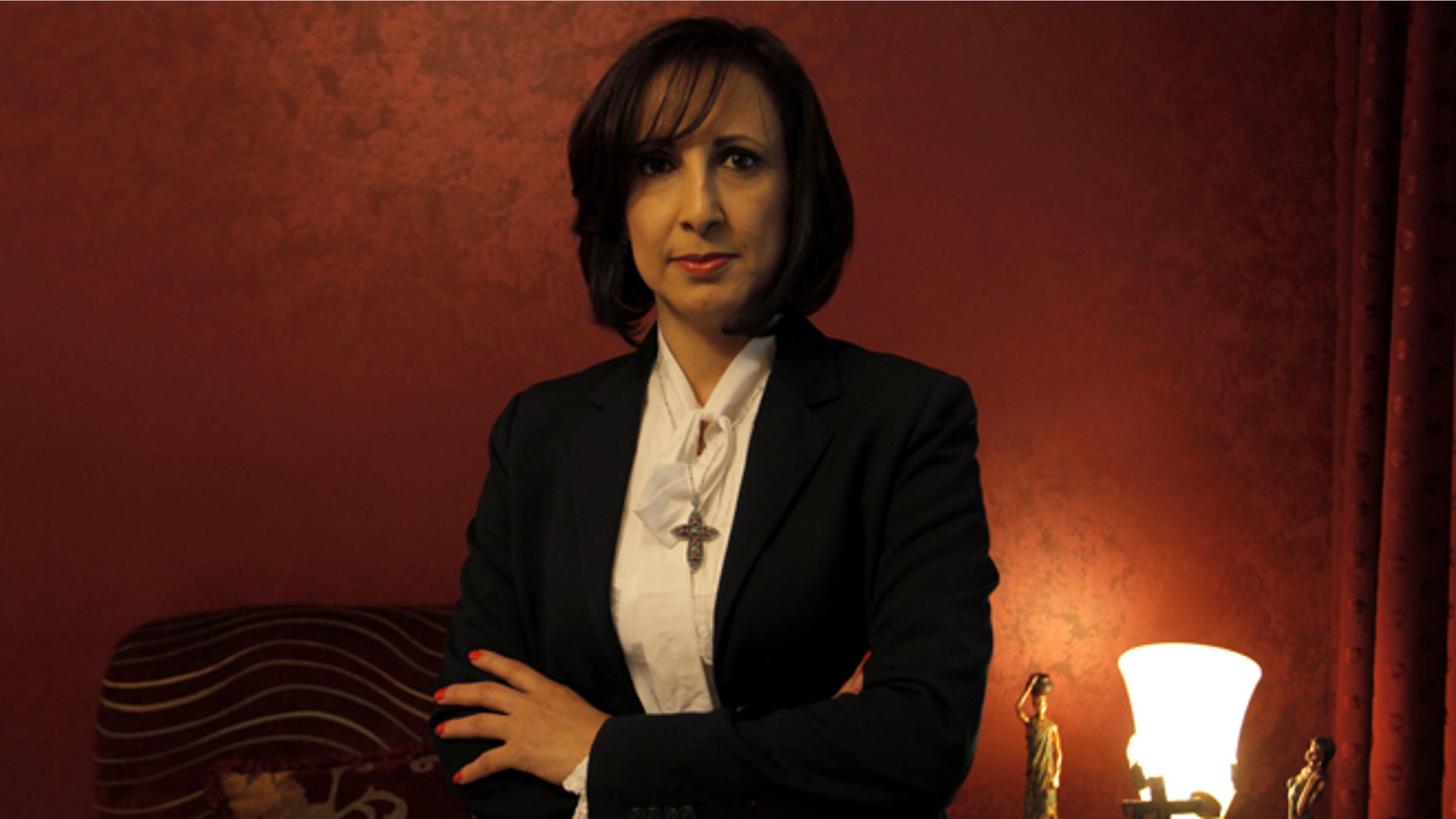 May 26, 2012: Former assistant manager of corporate operations for Jordan Dubai Islamic Bank Vivian Salameh poses for a portrait in Amman, Jordan.