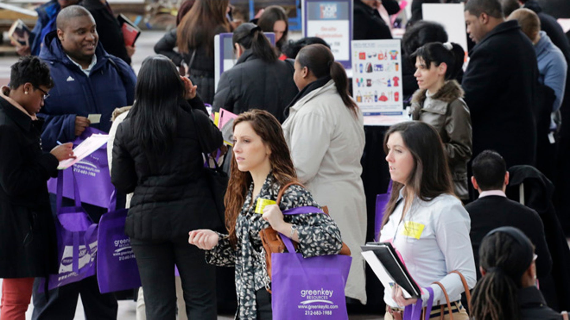 In this March 14, 2013, file photo, a crowd of job seekers attends a health care job fair in New York. Almost 6 million young people, ages 16 to 24, are neither in school nor working, according to a study released Monday, Oct. 21, 2013, by The Opportunity Nation coalition. The study also finds that 49 states have seen an increase in the number of families living in poverty and 45 states have seen household median incomes fall in the last year. The dour report underscores the challenges young adults face now and foretell challenges they are likely to face as they get older.