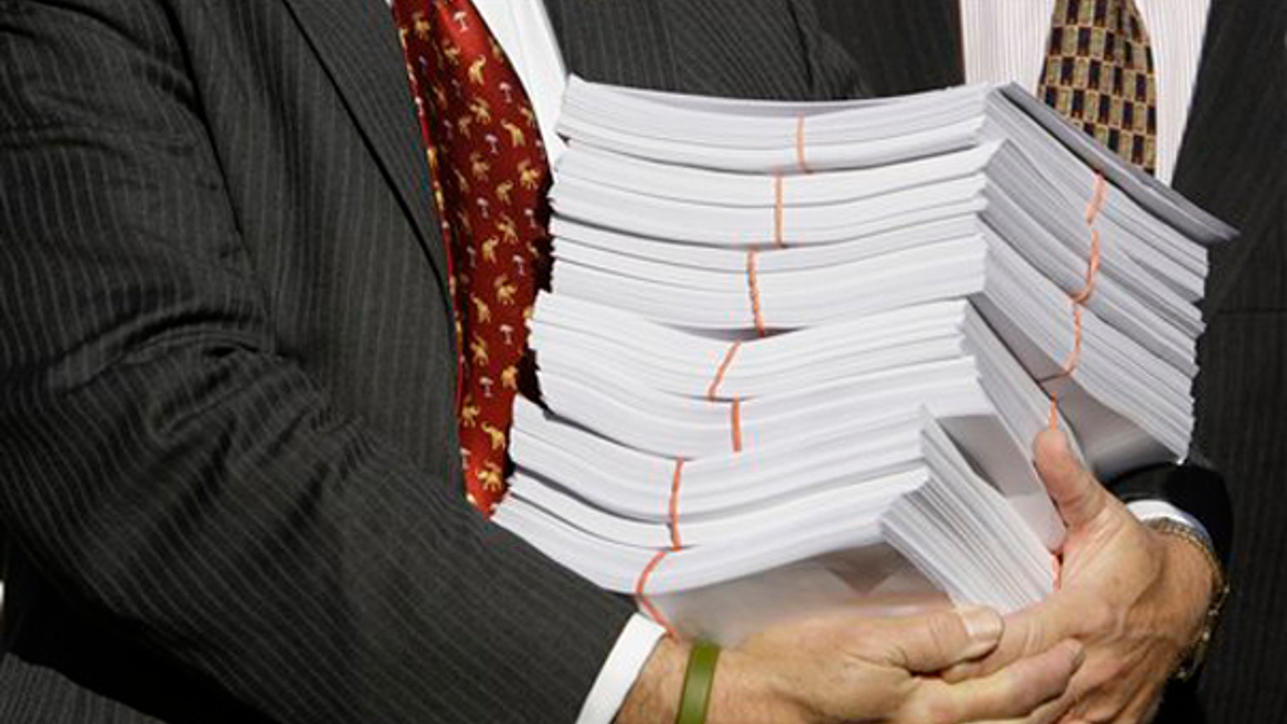 The 1,900-page House health care bill, shown here, is expected to come to the floor for debate in a matter of days. (AP Photo)