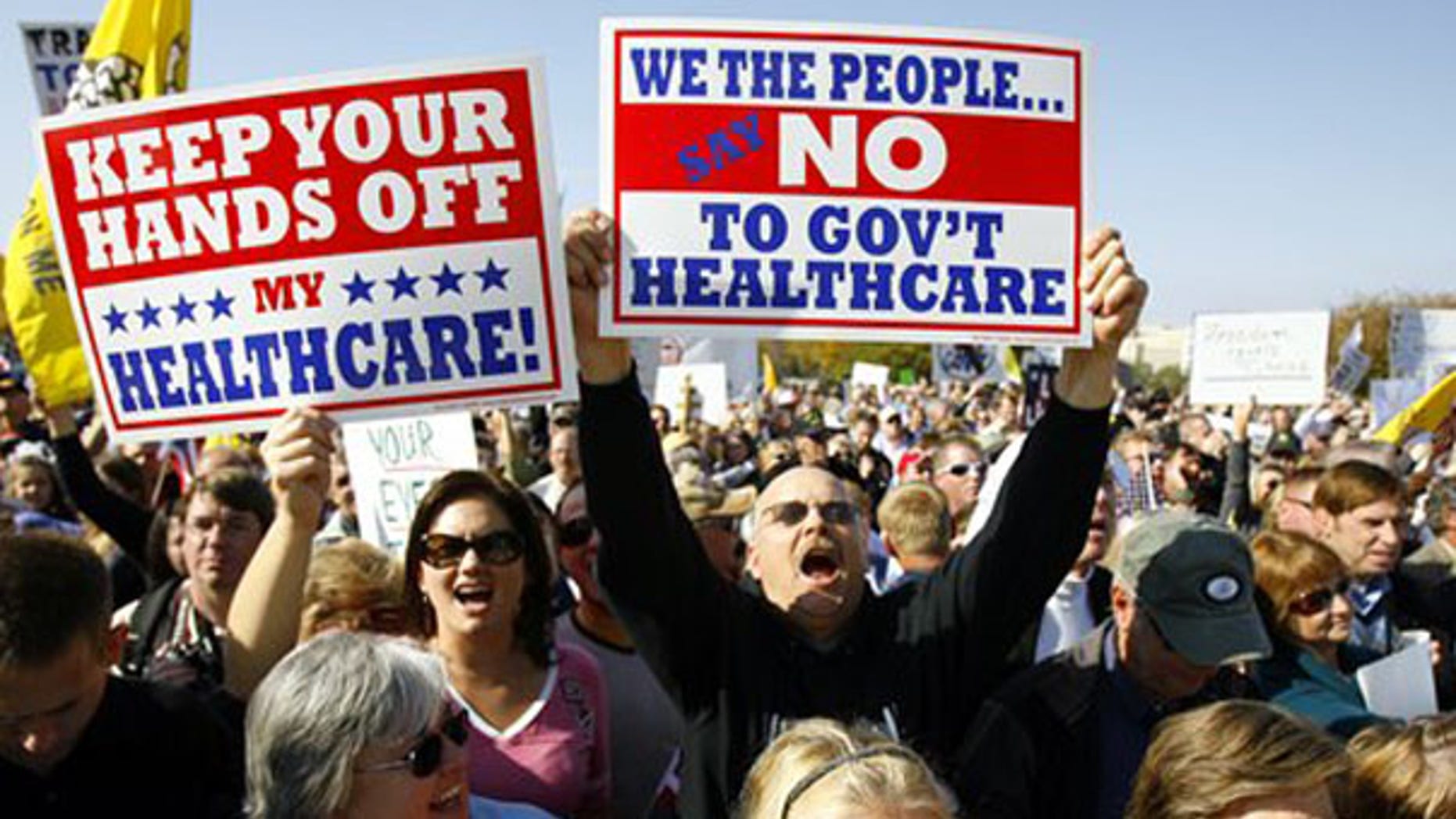 Demonstrators chant on Capitol Hill Nov. 5 during a Republican health care reform rally. (AP Photo)