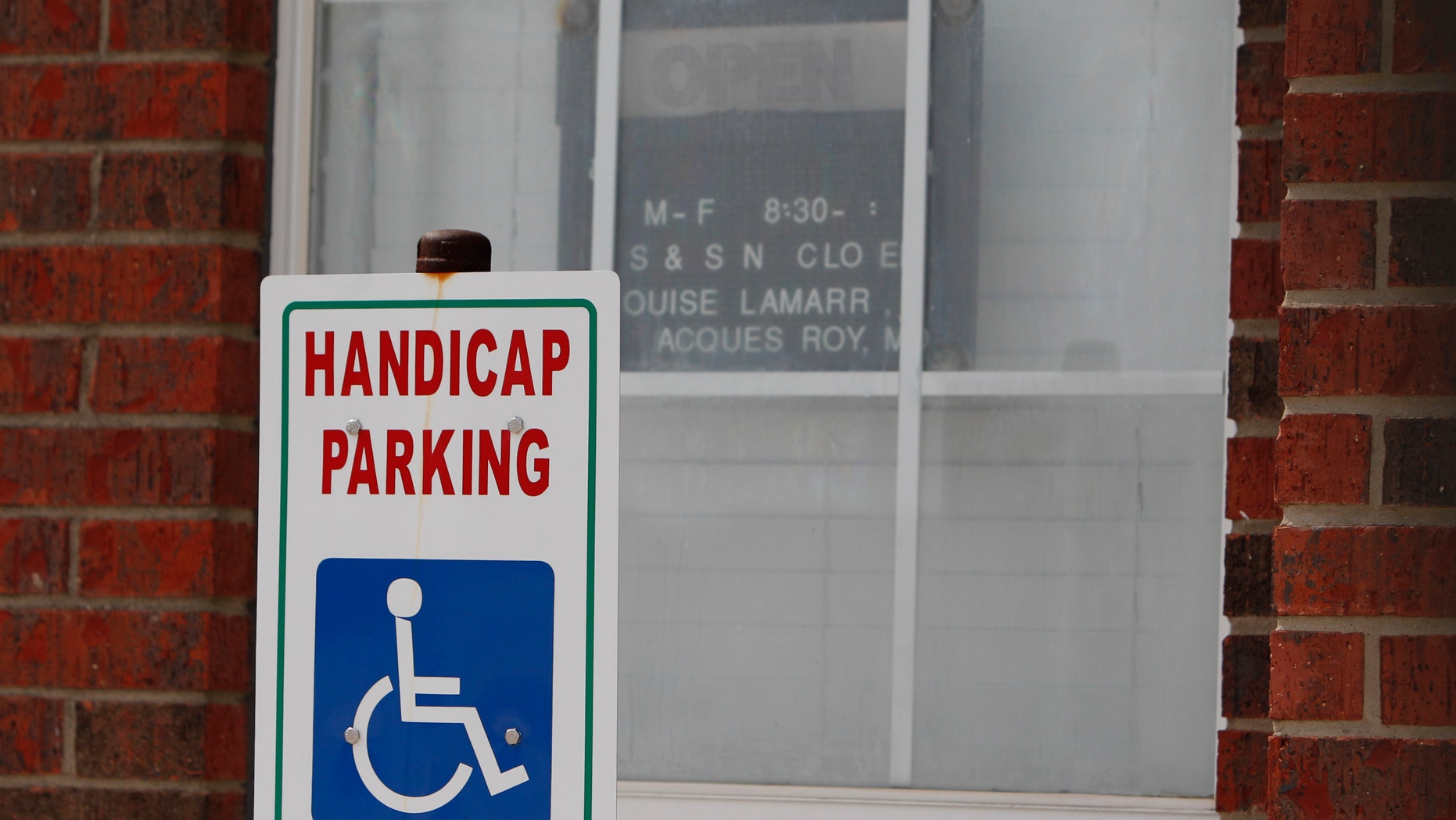 March 1, 2012: This file photo shows the office window of Medistat Group Associates in DeSoto, Texas.