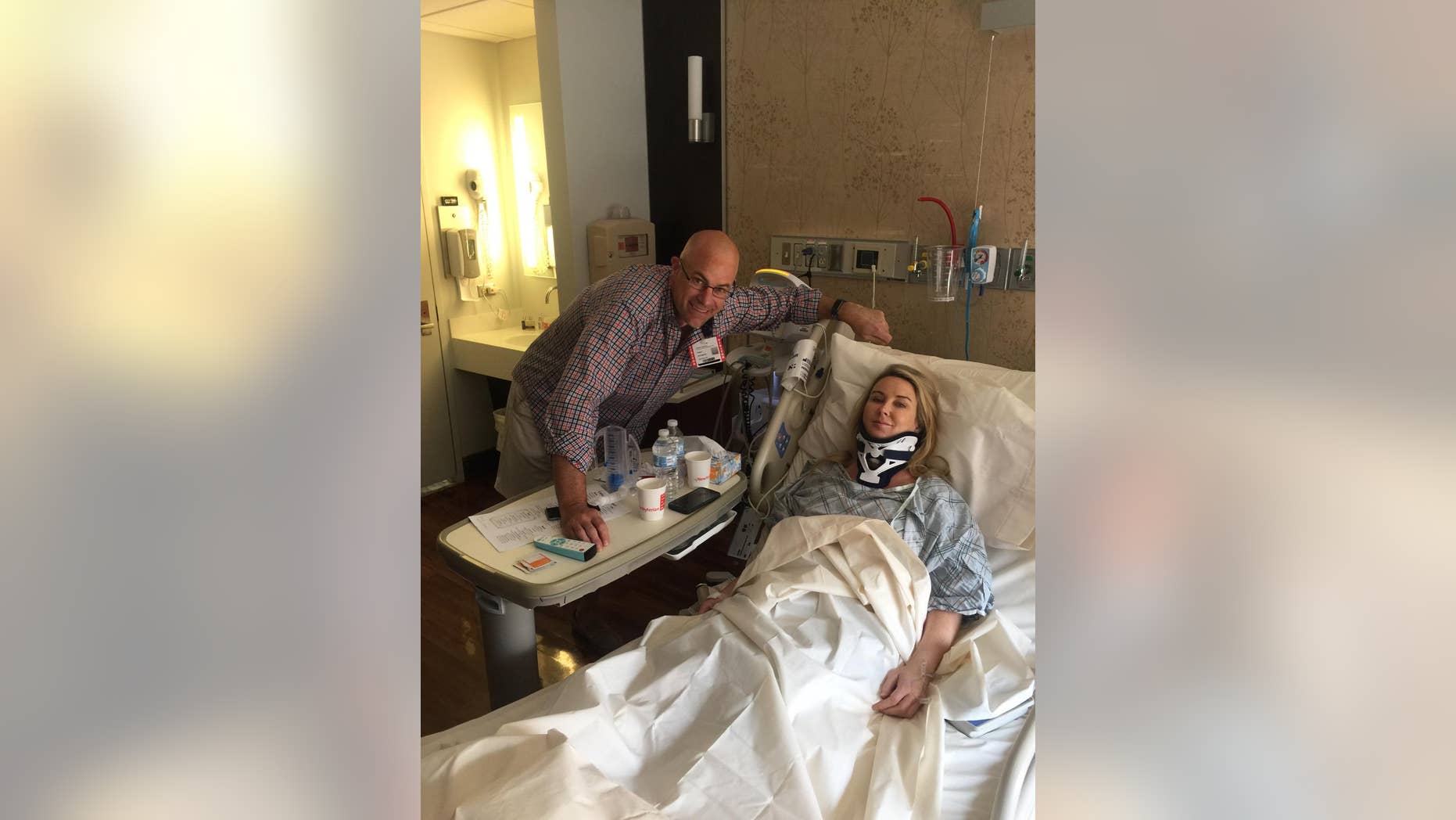 Heather Childers is visited by a friend while recovering after surgery at New York Presbyterian Columbia Medical Center in July