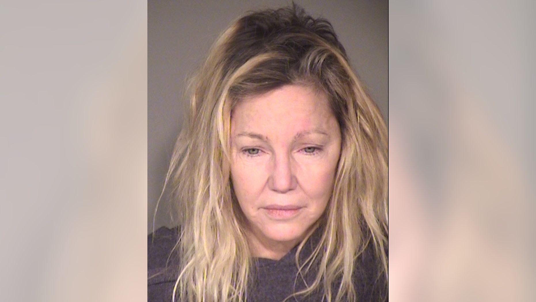 Police said Heather Locklear appeared "heavily intoxicated" and was "arguing with other subjects at the residence."