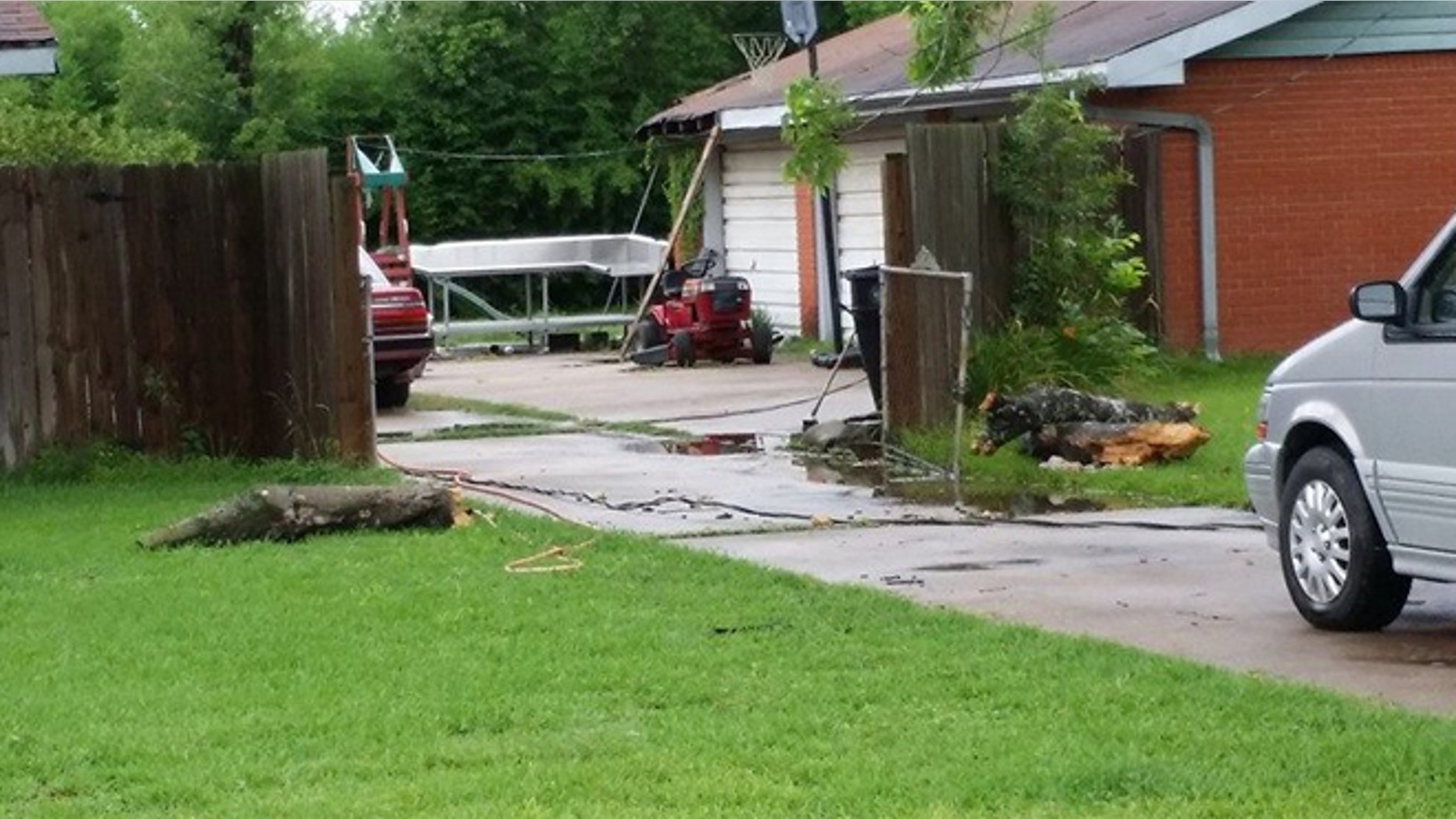 Police say a boy witnessed as his 52-year-old mother was struck by a fallen tree branch that killed her following severe weather that impacted much of southeast Texas.