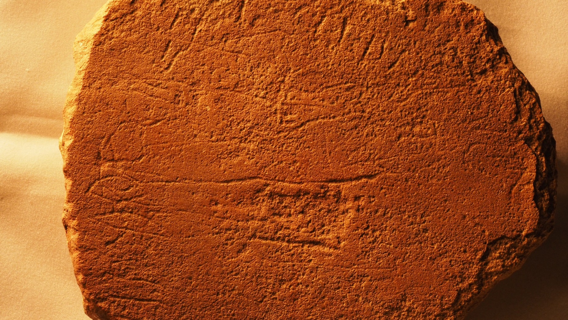 A photo of Sinai 375a, a stone slab from Egypt, which is now located in the Harvard Semitic Museum. This photo contains the name Ahisamach (Exodus 31:6) on the two horizontal lines. (Credit: Douglas Petrovich)