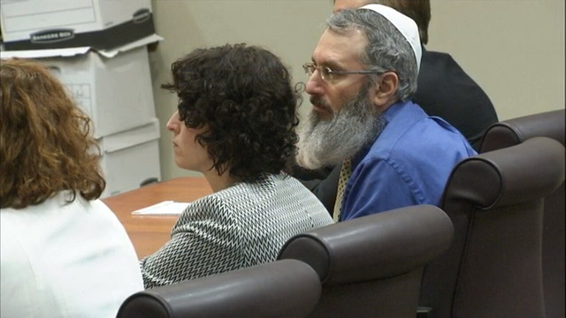 Hemy Neuman, right, in court.