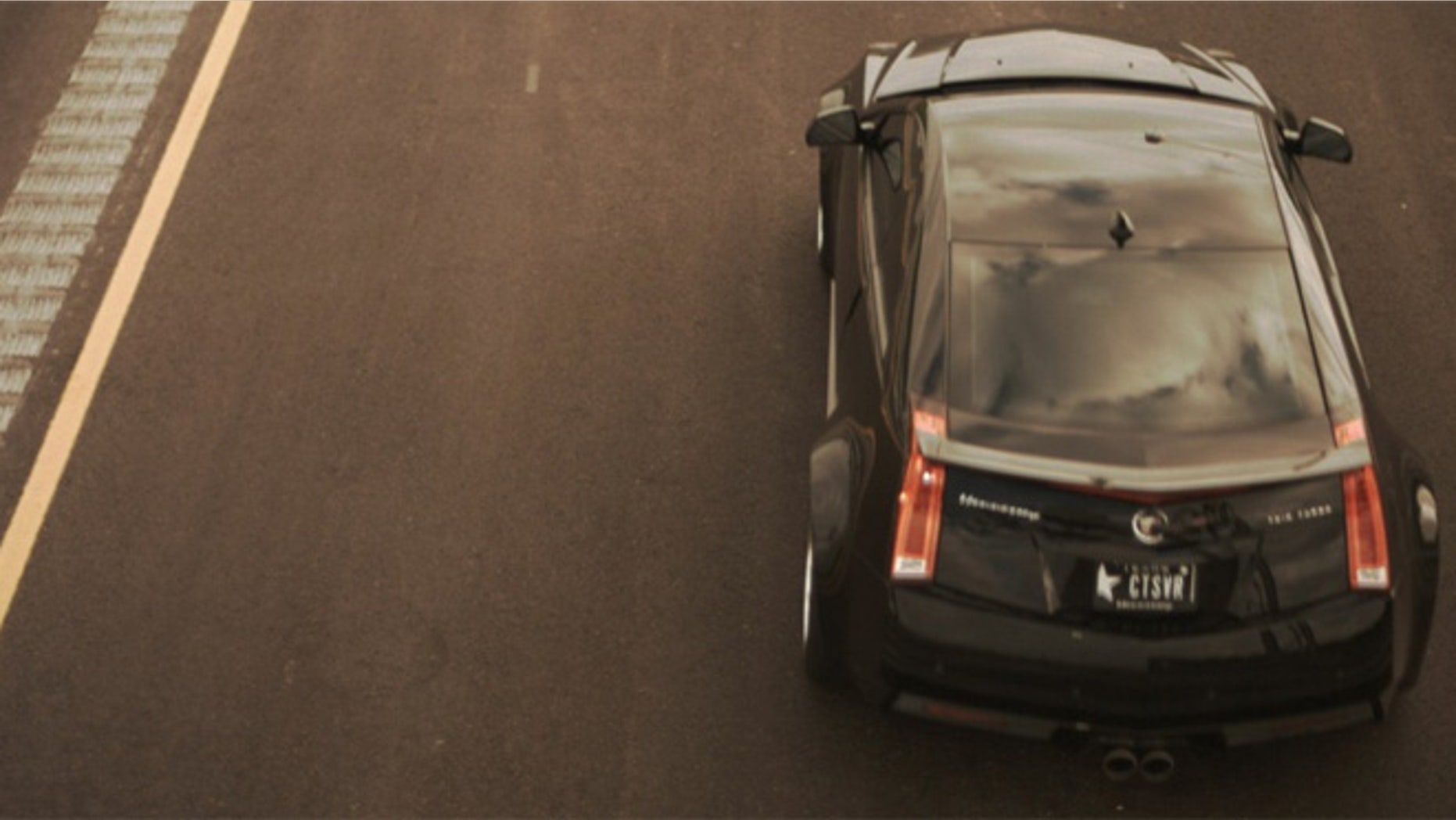 TxTag image of Hennessey Cadillac passing camera at over 180 mph.