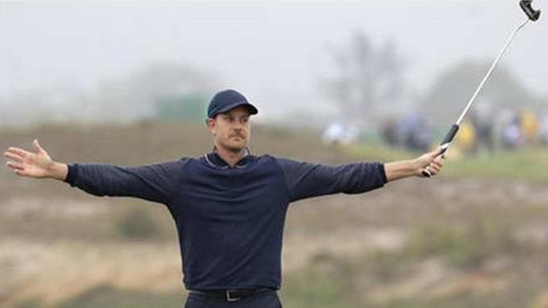 Henrik Stenson of Sweden reacts to putt during second round of the men's golf event at the Rio Olympics.