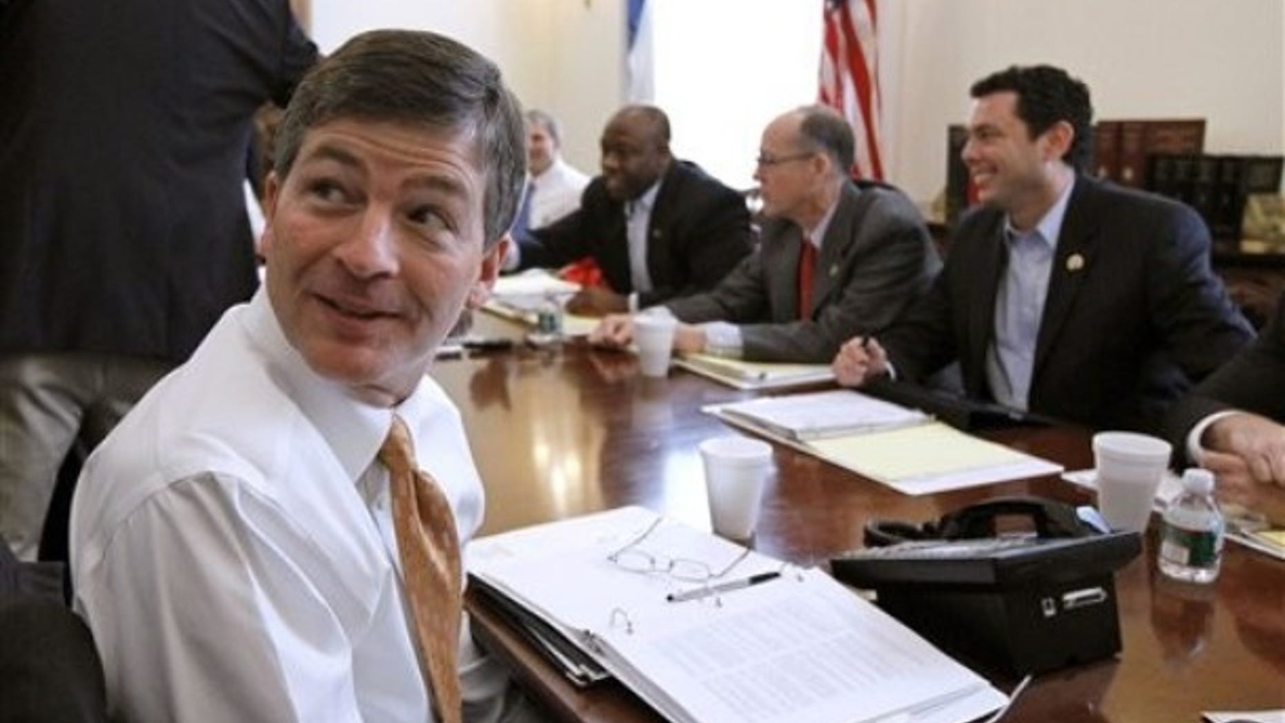 FILE: Republican Rep. Jeb Hensarling of Texas turns around to answer a reporter's question on Nov. 9 during a photo session taken during a Republican transition team meeting