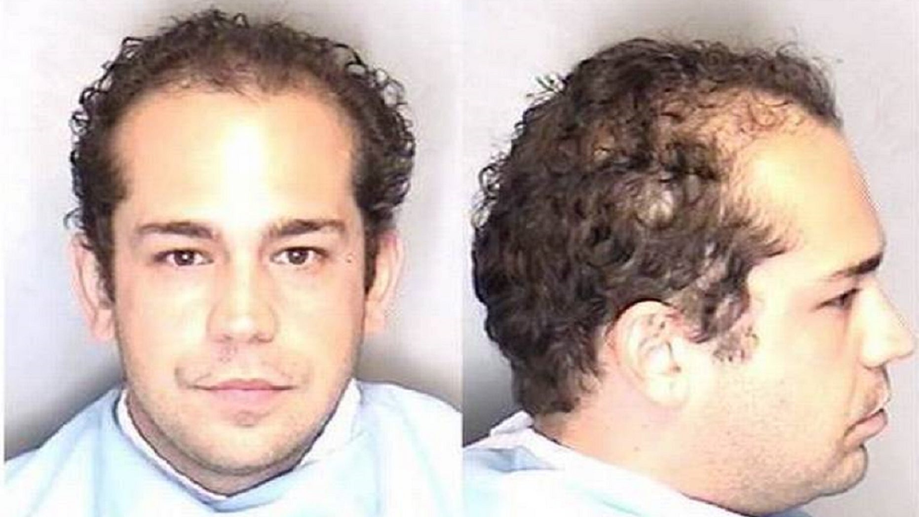 Michael Henslick, 30, has been charged with murder of Holly Cassano, who was found dead in her mobile home in Mahomet, Illinois on Nov. 2, 2009.
