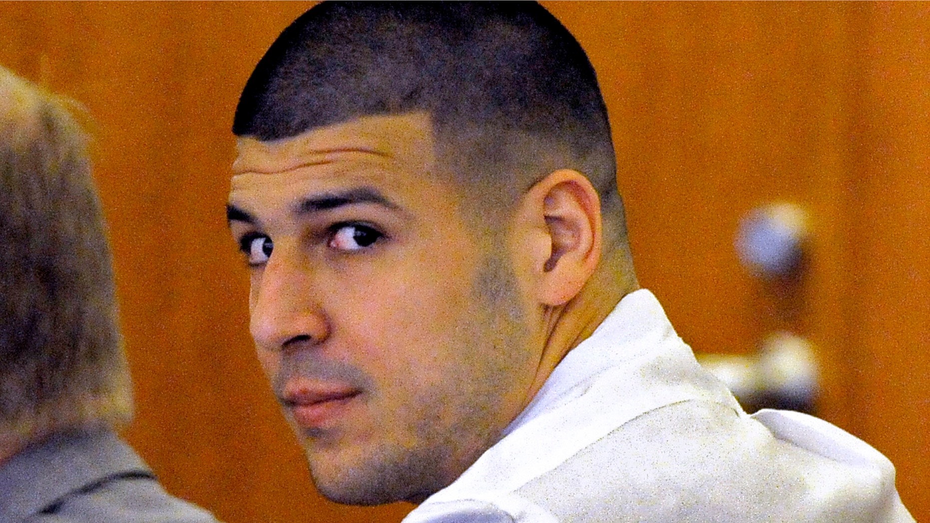 Aaron Hernandez appears at Fall River Superior Court Tuesday, Sept. 30, 2014 in Fall River, Mass. Hernandezâs attorneys are arguing a motion to suppress evidence in his murder trial. They want to suppress evidence from a cell phone they say was illegally seized and a police interrogation they call unlawful. Hernandez is awaiting trial in the 2013 killing of semi-professional football player Odin Lloyd. (AP Photo/The Boston Herald, Ted Fitzgerald, Pool)
