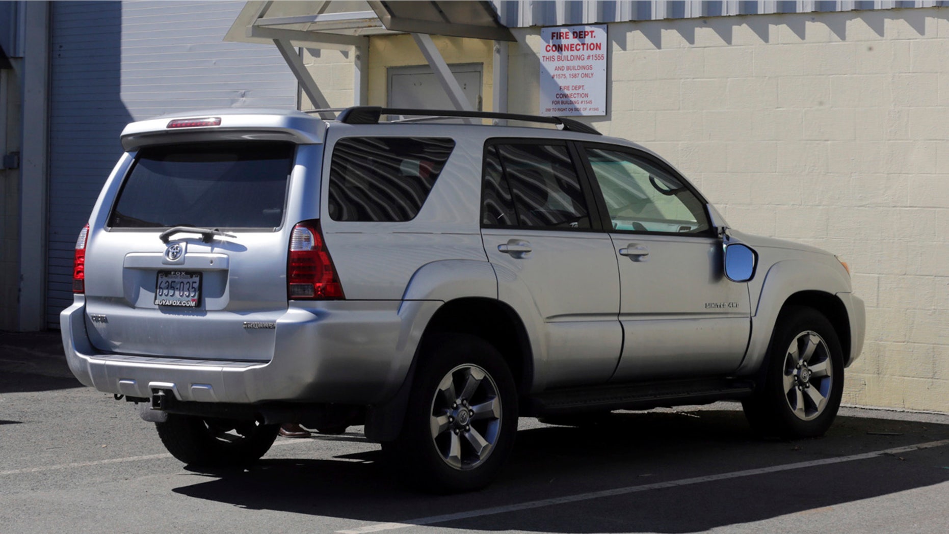 In this March 3, 2017, file, photo, the Toyota 4Runner held in a Boston Police evidence lot in the Hyde Park neighborhood of Boston is seen during a "view" of pertinent locations and evidence in the Aaron Hernandez trial.