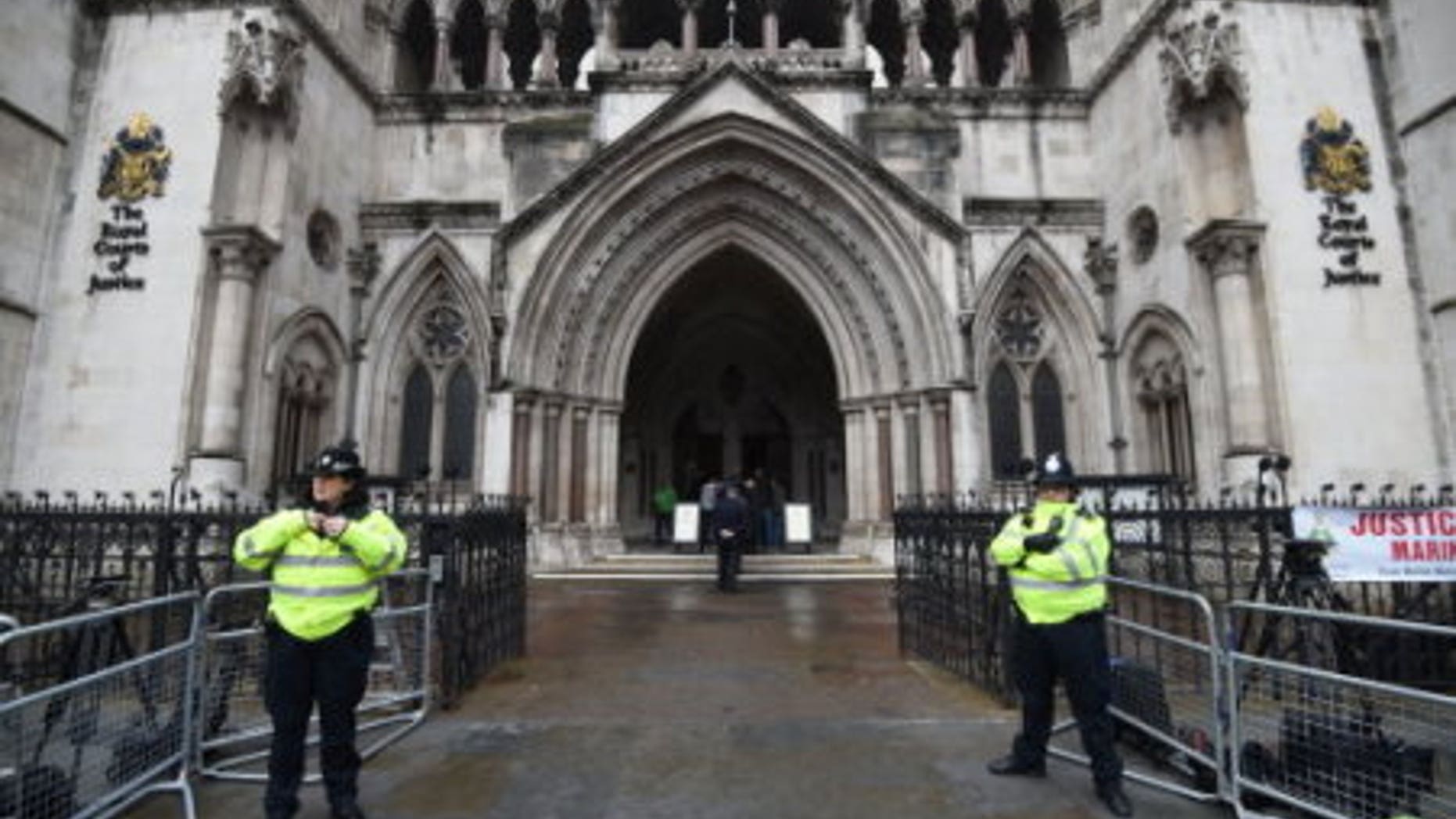Police officers outside the High Court in central London, in February.