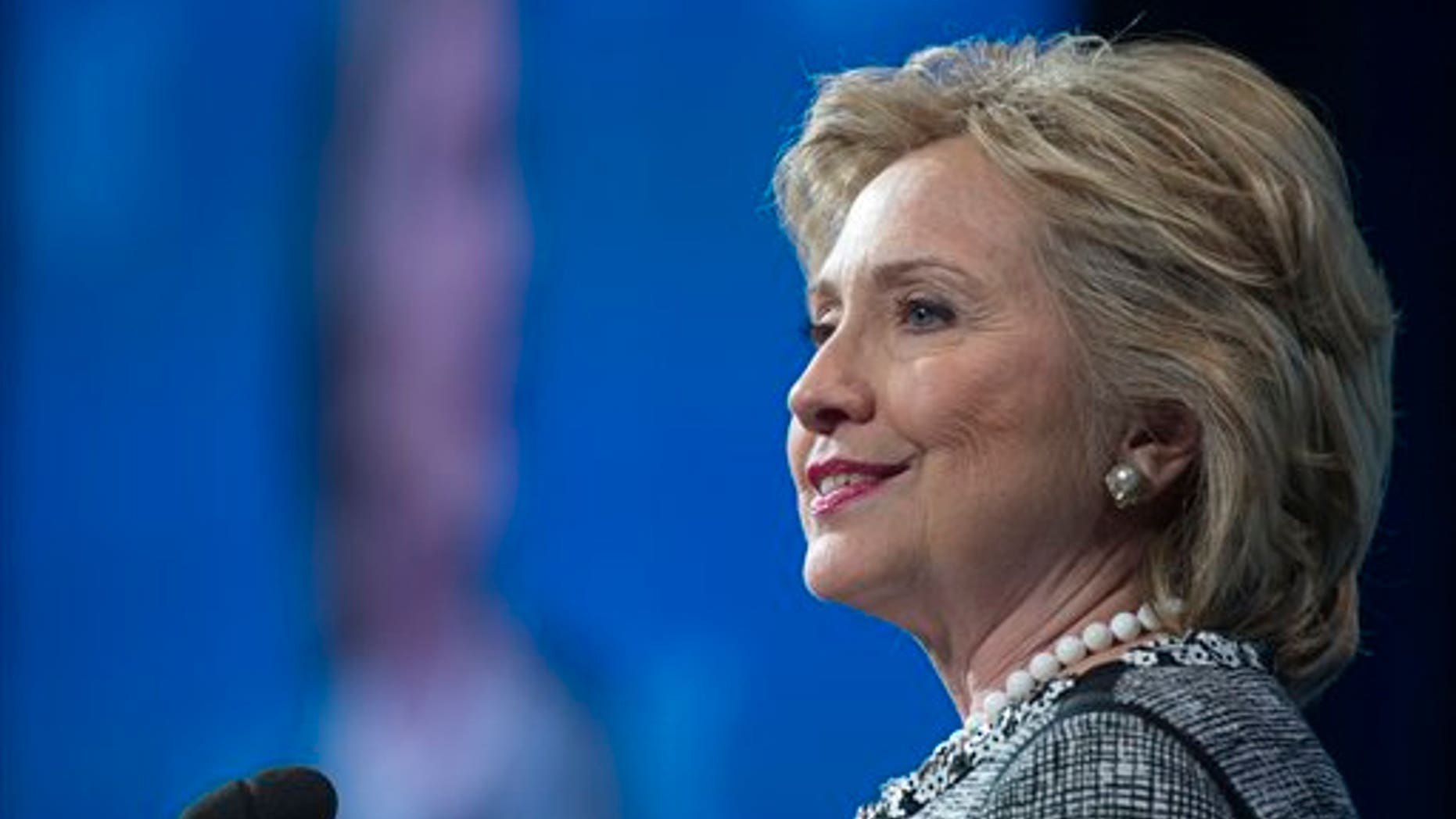 Former Secretary of State Hillary Rodham Clinton addresses the American Jewish Committee (AJC) Global Forum closing plenary in Washington, Wednesday, May 14, 2014. (AP Photo/Cliff Owen)