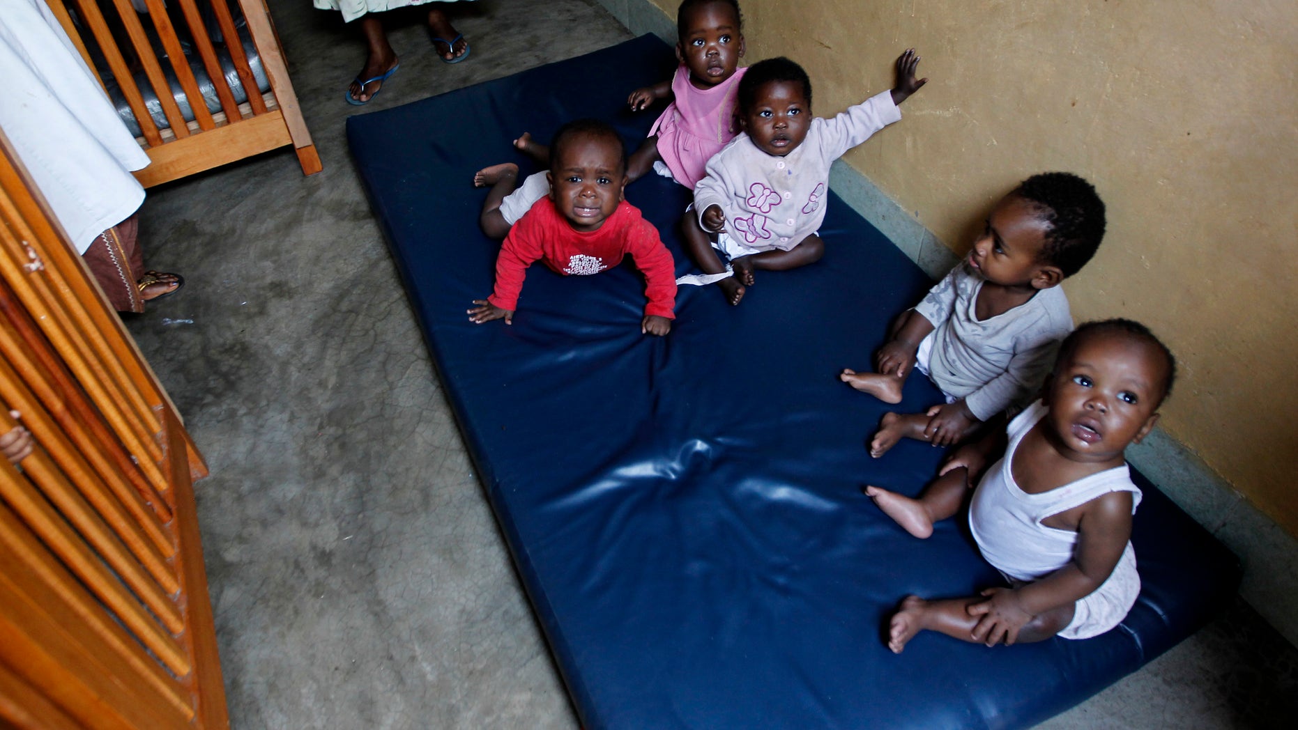 Abandoned children play at the Don Bosco Ngangi community center in the Democratic Republic of the Congo. The center was established in 1988 and hosts over 3,000 abandoned children and HIV/AIDS victims.(REUTERS/Thomas Mukoya)