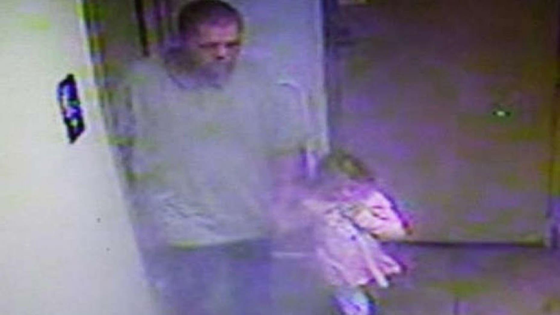 Surveillance footage taken from a Georgia gas station showing West Wild Hogs and Rebecca Lewis.