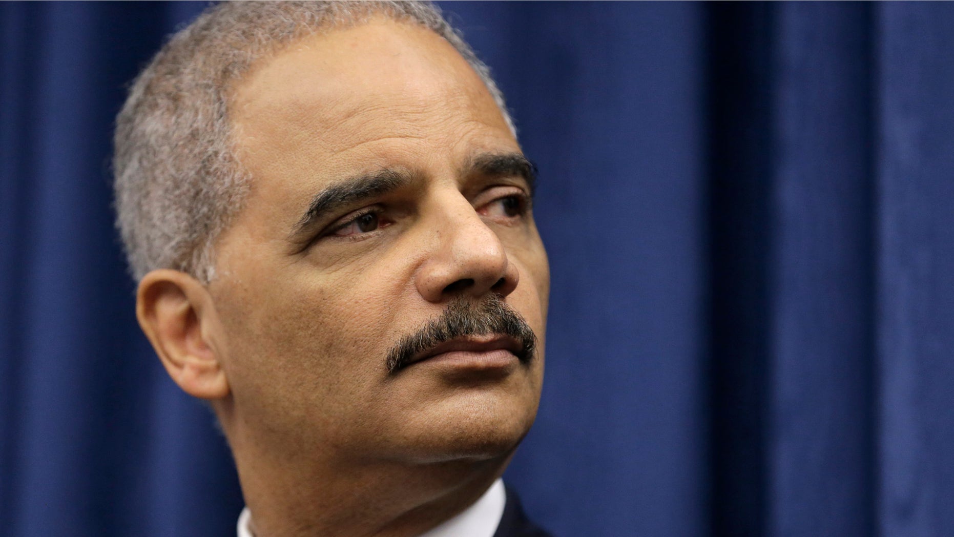 Dec. 4, 2014: U. S. Attorney General Eric Holder speaks during a news conference before a roundtable meeting in Cleveland.