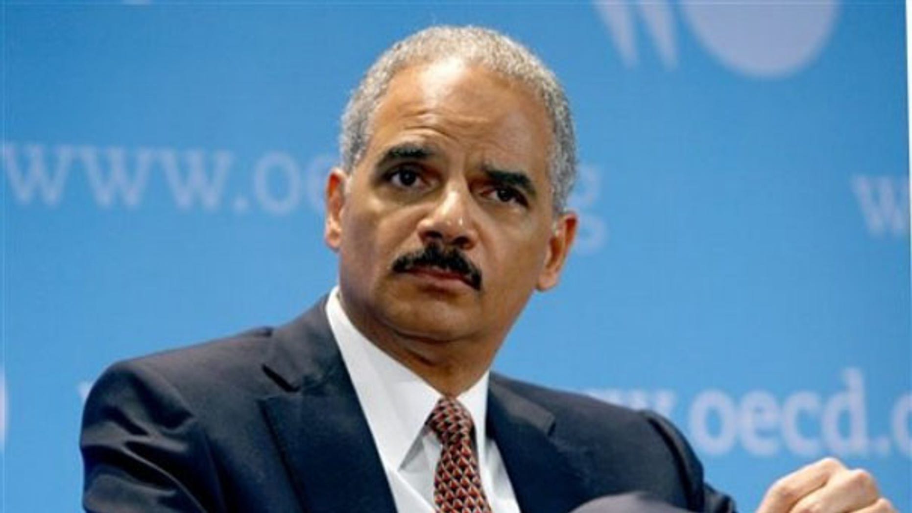 Attorney General Eric Holder is seen at the Organization for Economic Co-operation and Development during a meeting May 31 in Paris. (AP Photo)
