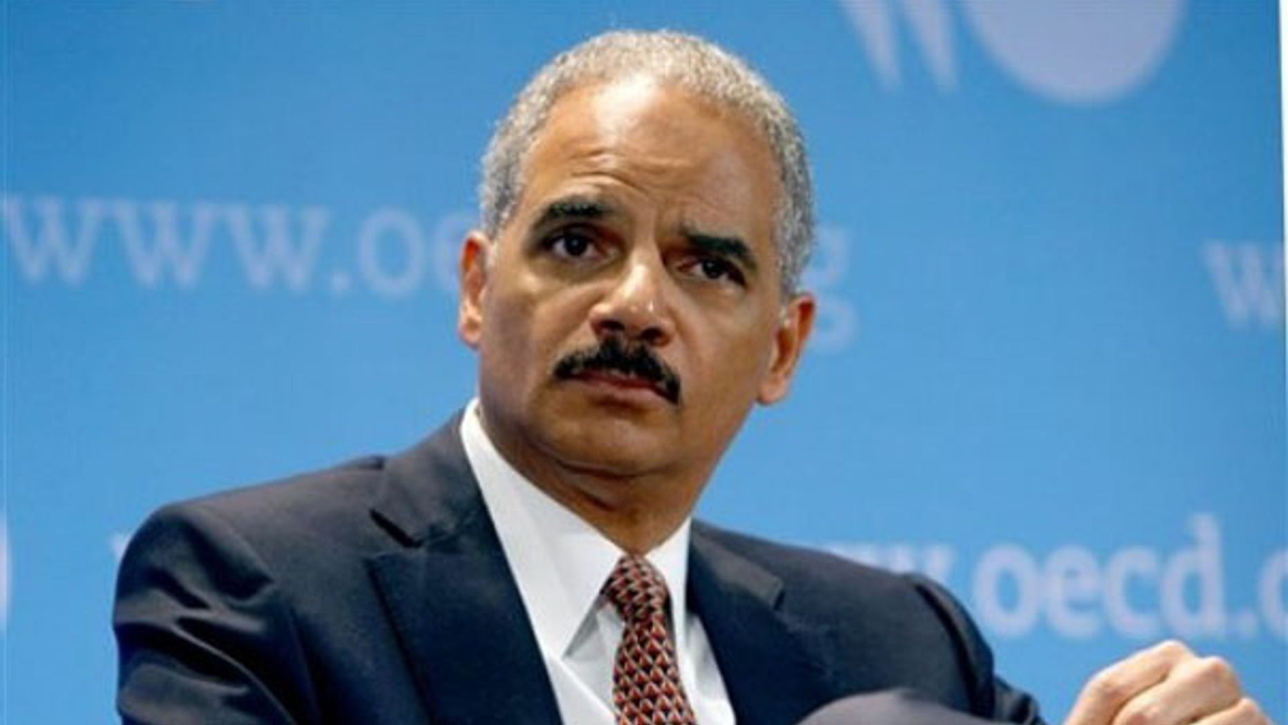 Attorney General Eric Holder is seen at the Organization for Economic Co-operation and Development during a meeting May 31 in Paris. (AP Photo)