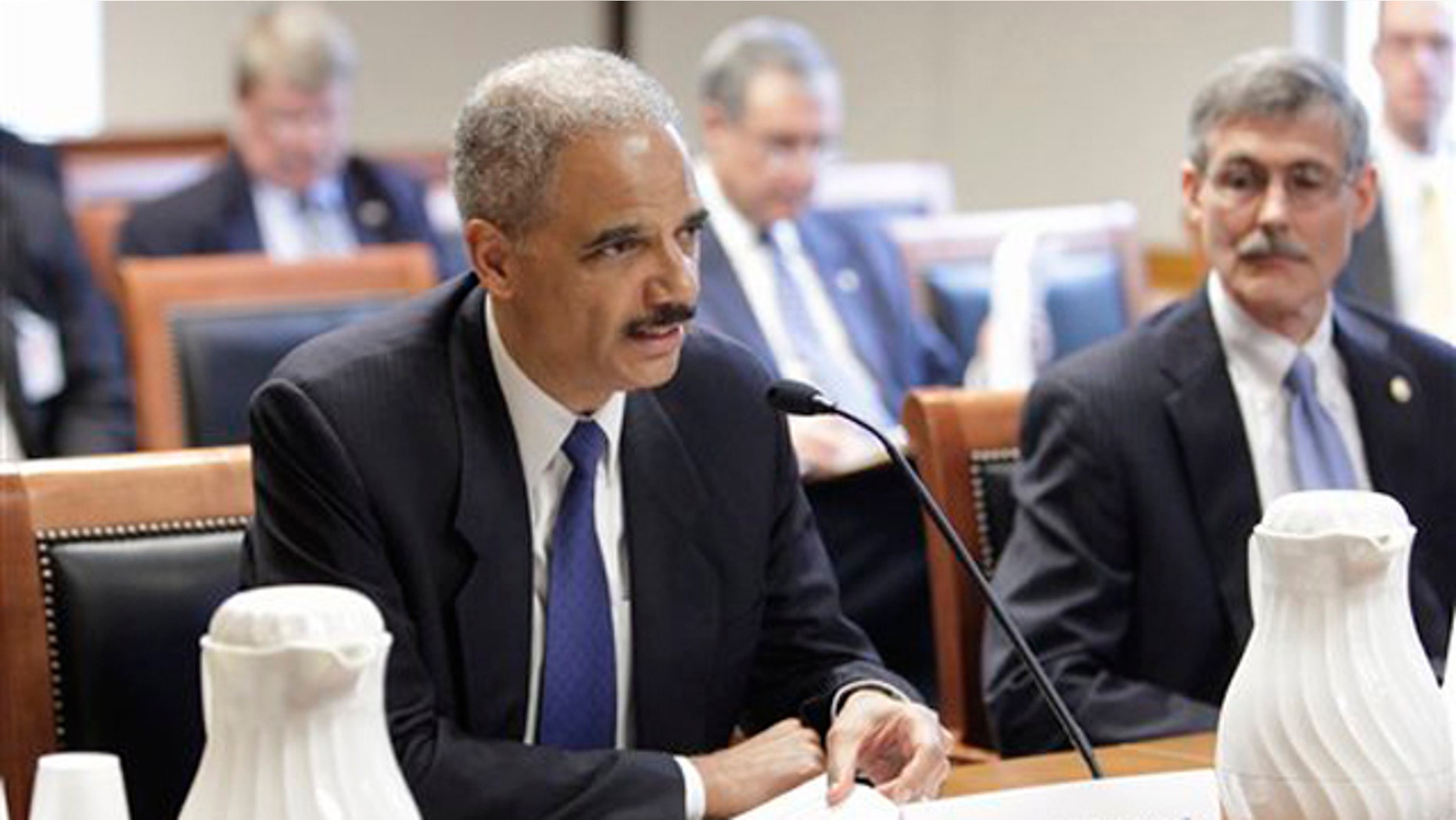 Attorney General Eric Holder testifies before the U.S. Sentencing Commission June 1 at the Thurgood Marshall Federal Judiciary Building in Washington.