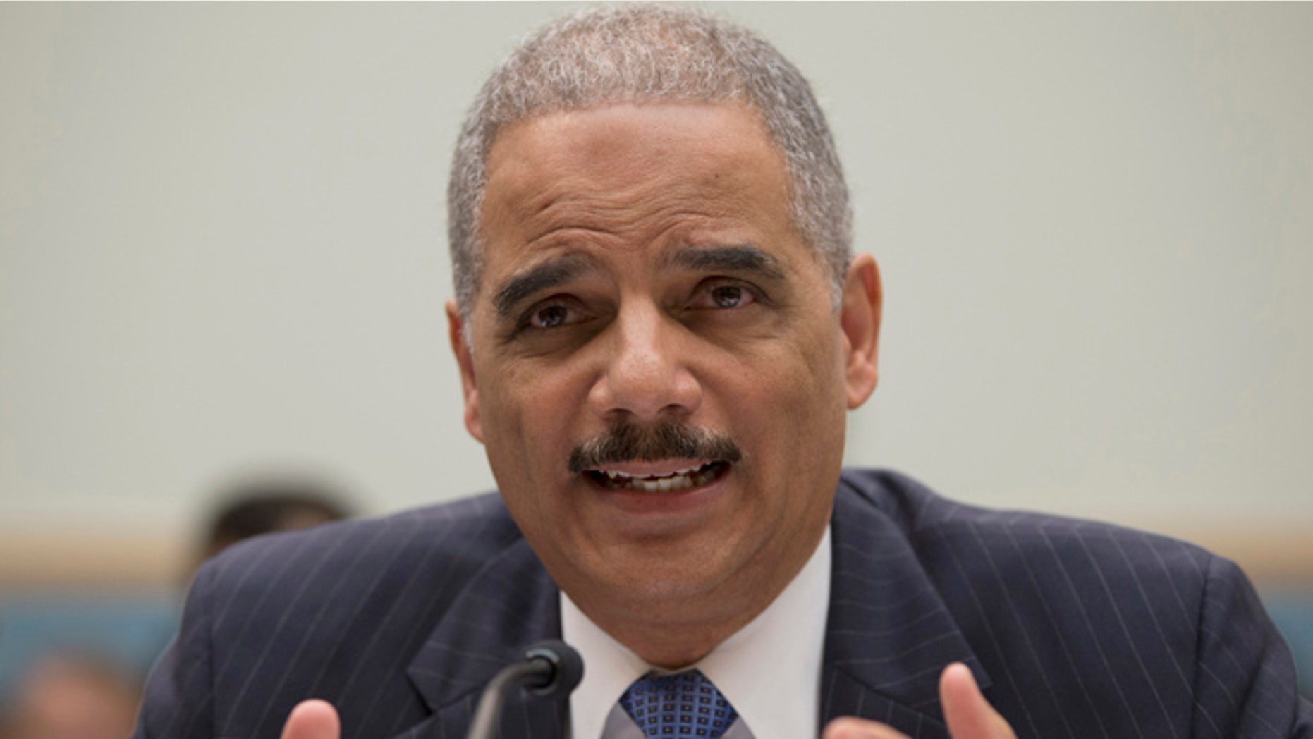 May 15, 2013: Attorney General Eric Holder gestures while testifying on Capitol Hill in Washington.