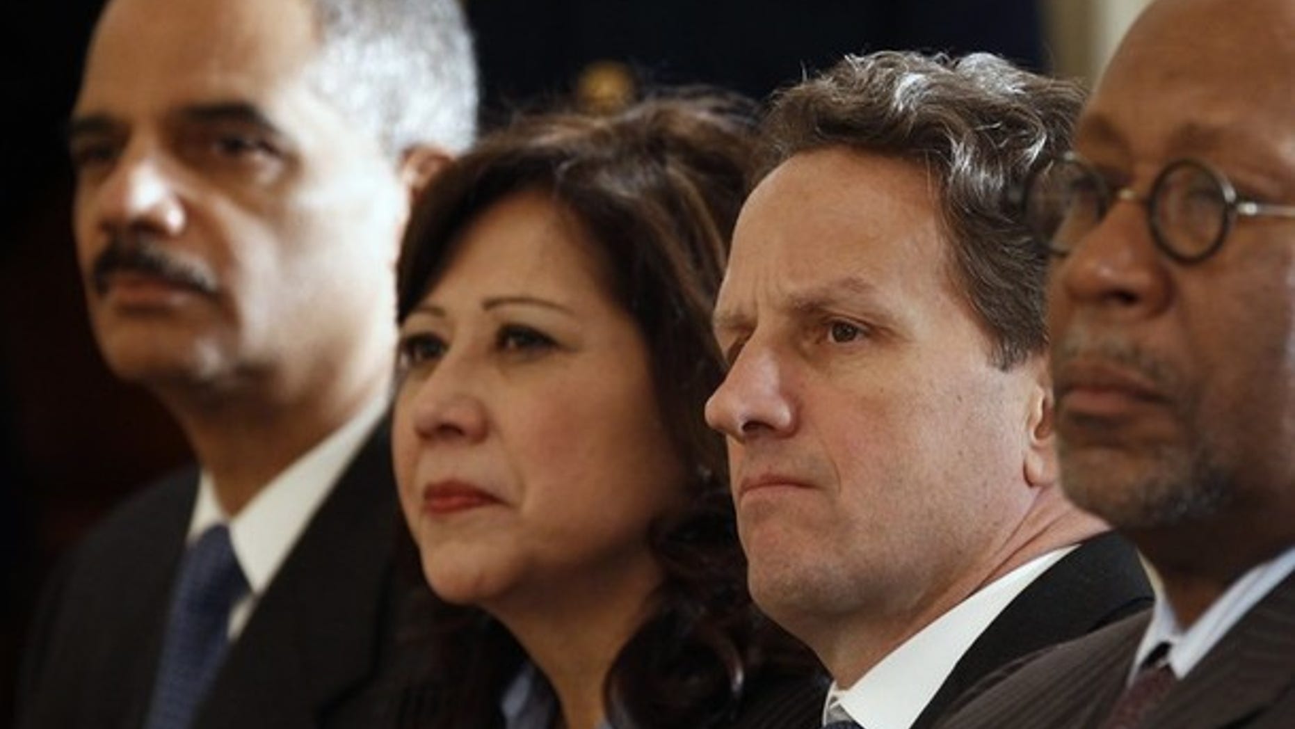 Attorney General Eric Holder, Labor Secretary Hilda Solis, Treasury Secretary Tim Geithner and U.S. Trade Representative Ron Kirk in Washington January 24, 2011. (Reuters)