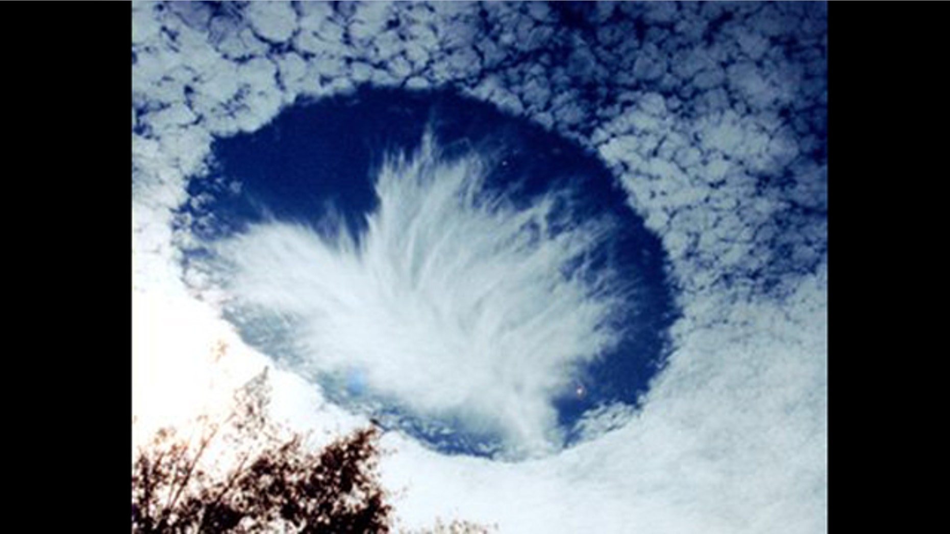 Planes can accidentally punch holes in clouds, leaving snow or rain in their wake, according to a new paper.