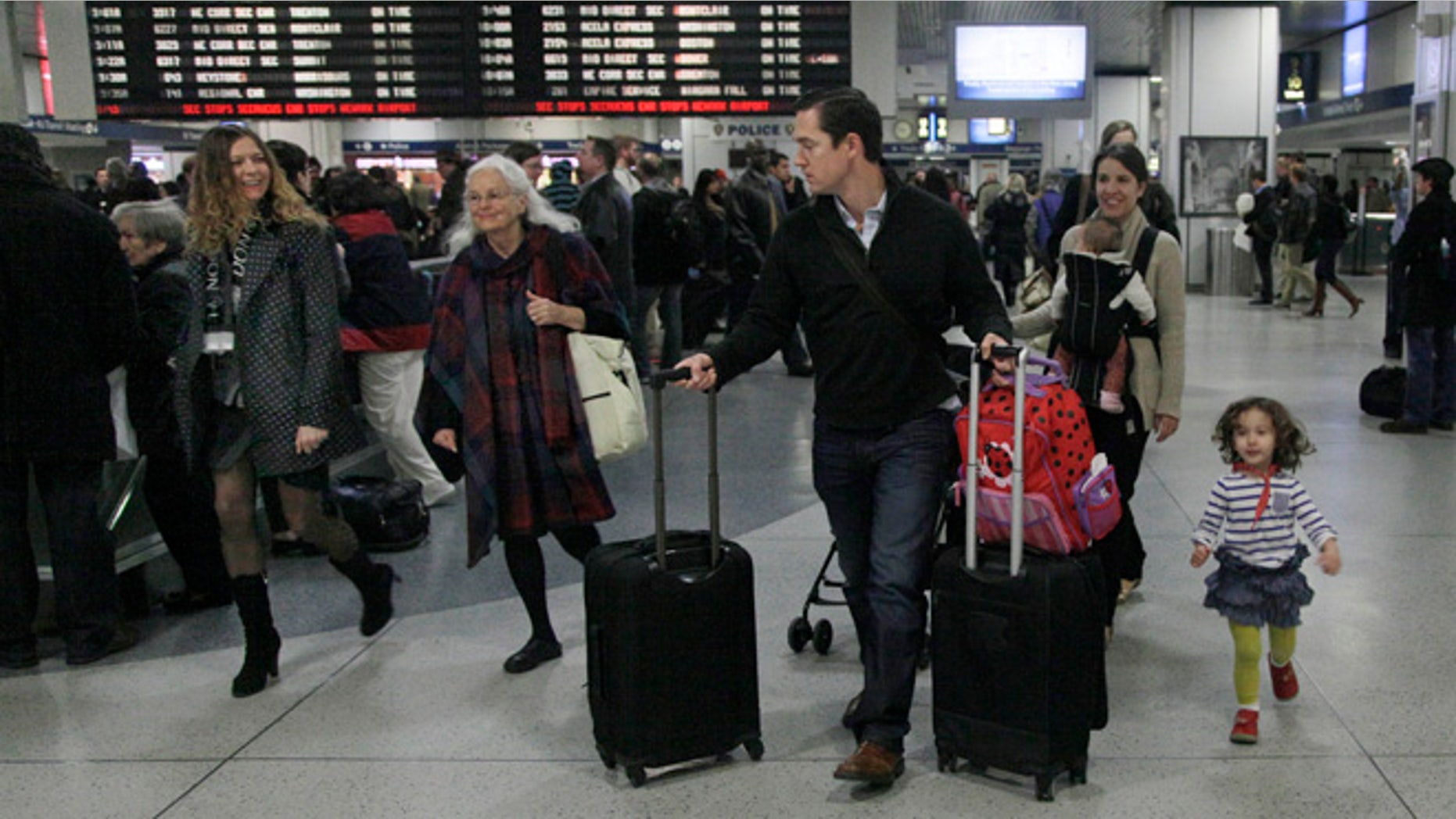 Nov. 21, 2012: Travelers walk through New York's Penn Station.