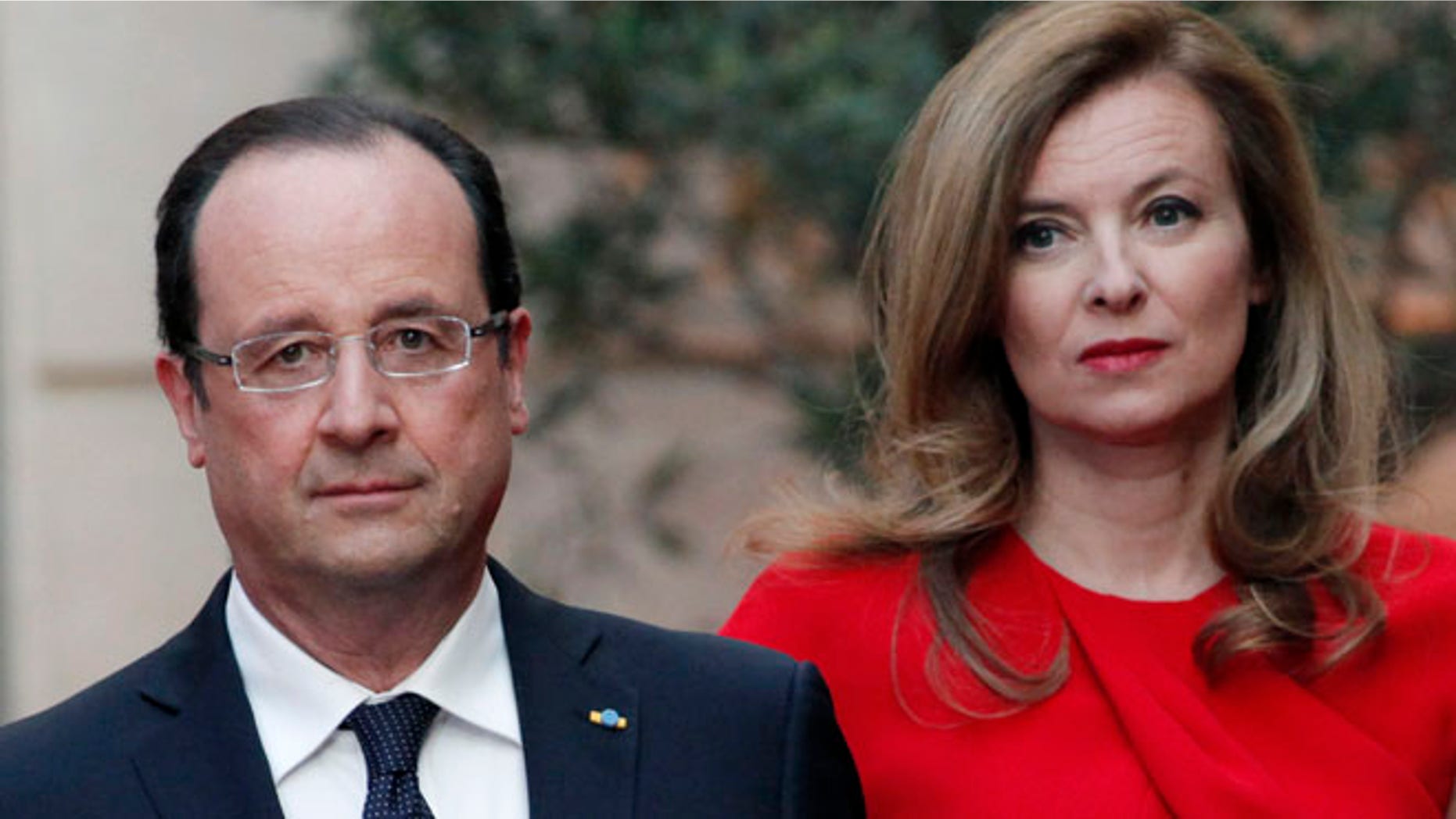 May. 7, 2013: In this file photo, French President Francois Hollande, left, and his companion Valerie Trierweiler arrive for a state dinner at the Elysee Palace, in Paris as part of Polish President Bronislaw Komorowski's two-day visit to France.