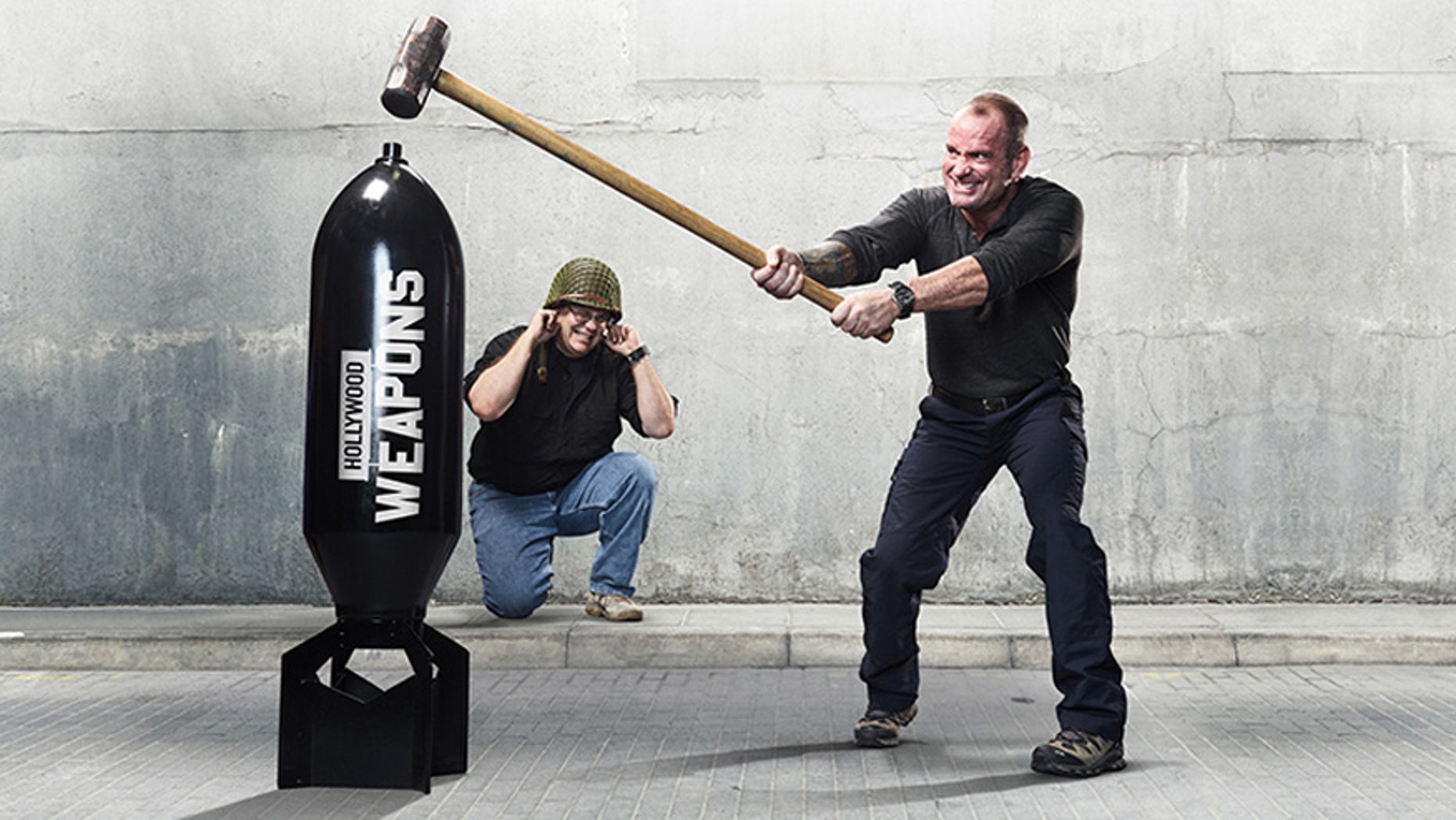 Terry Schappert (R) and arms expert Larry Zanoff show viewers where fact meets fiction.