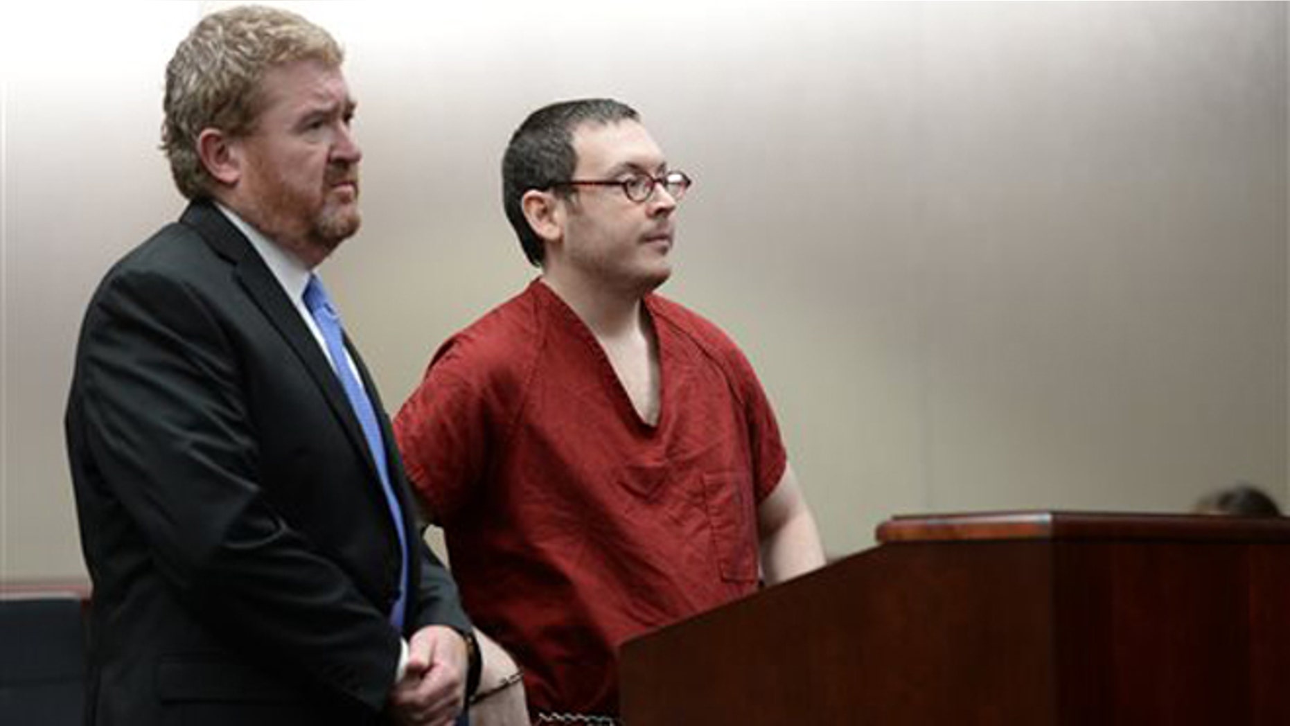 Aug. 26, 2015: Colorado theater shooter James Holmes appears in court, with his attorney Daniel King, to be formally sentenced in Centennial, Colo. Holmes was sentenced to life in prison without parole by Judge Carlos Samour Jr. Holmes killed 12 people and injured 70 others in the July 20, 2012 ambush.