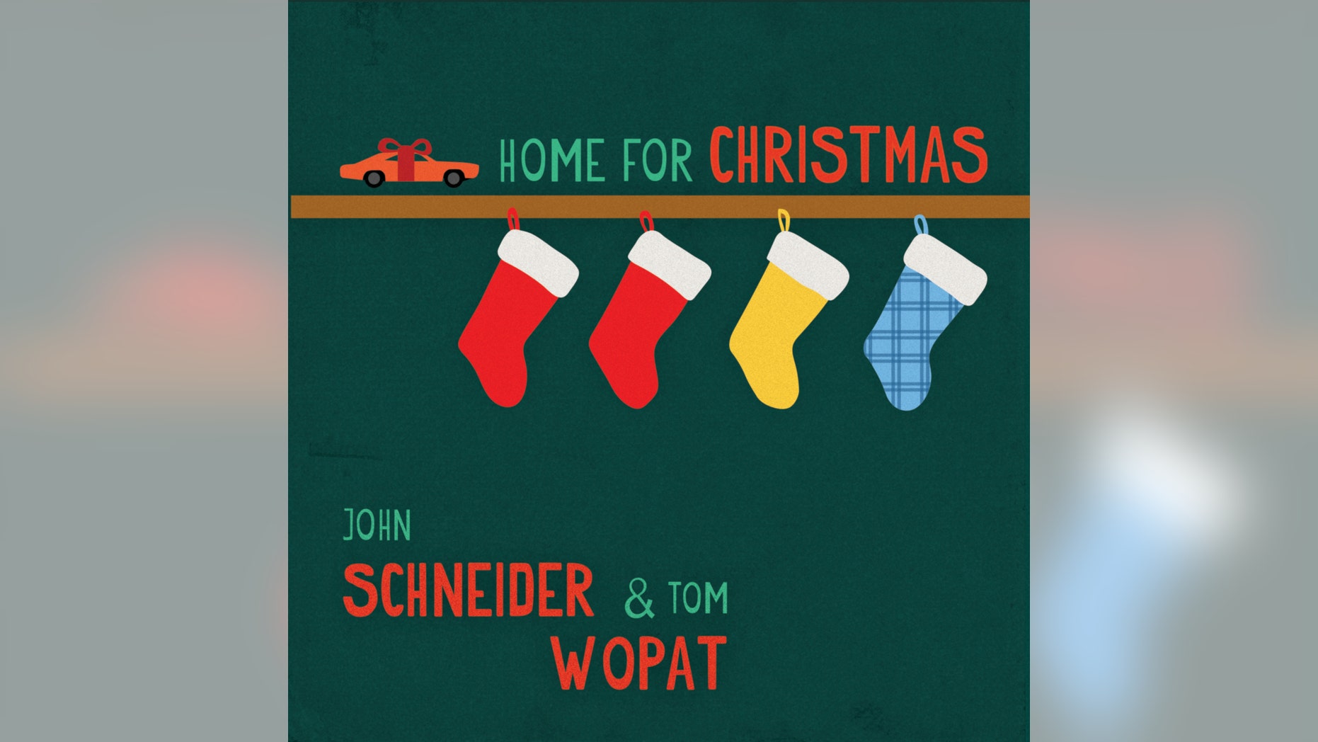 This CD cover image shows "Home for Christmas,"; a holiday album by John Schneider and Tom Wopat.