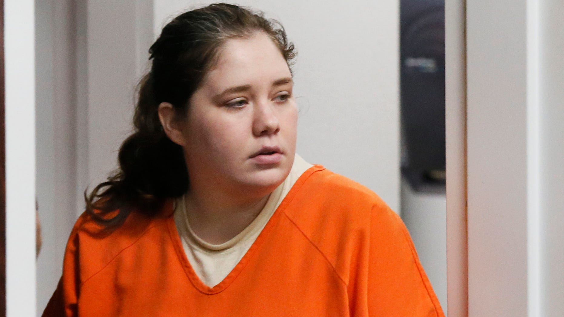 FILE - In this June 1, 2016, file photo, Adacia Chambers arrives for a court hearing in Stillwater, Okla. Chambers is accused of driving her car into spectators at Oklahoma State University's homecoming parade and killing four people in 2015. Her trial is scheduled to start Tuesday, Jan. 10, 2017 in Stillwater. (AP Photo/Sue Ogrocki, File)