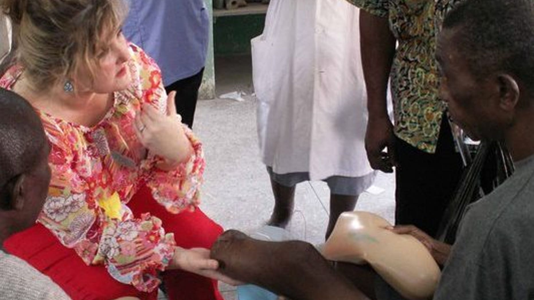 Gracie Rosenberger working with amputees in West Africa.
