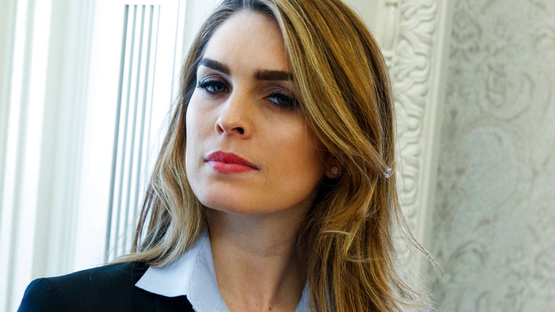 In this Feb. 9, 2018 photo, White House Communications Director Hope Hicks is shown during a meeting in the Oval Office between President Donald Trump and Shane Bouvet, in Washington. Hicks, one of President Donald Trump's most loyal aides, is resigning.
In a statement, the president praises Hicks for her work over the last three years. He says he "will miss having her by my side."
The news comes a day after Hicks was interviewed for nine hours by the panel investigating Russia interference in the 2016 election and contact between Trump's campaign and Russia. (AP Photo/Evan Vucci)