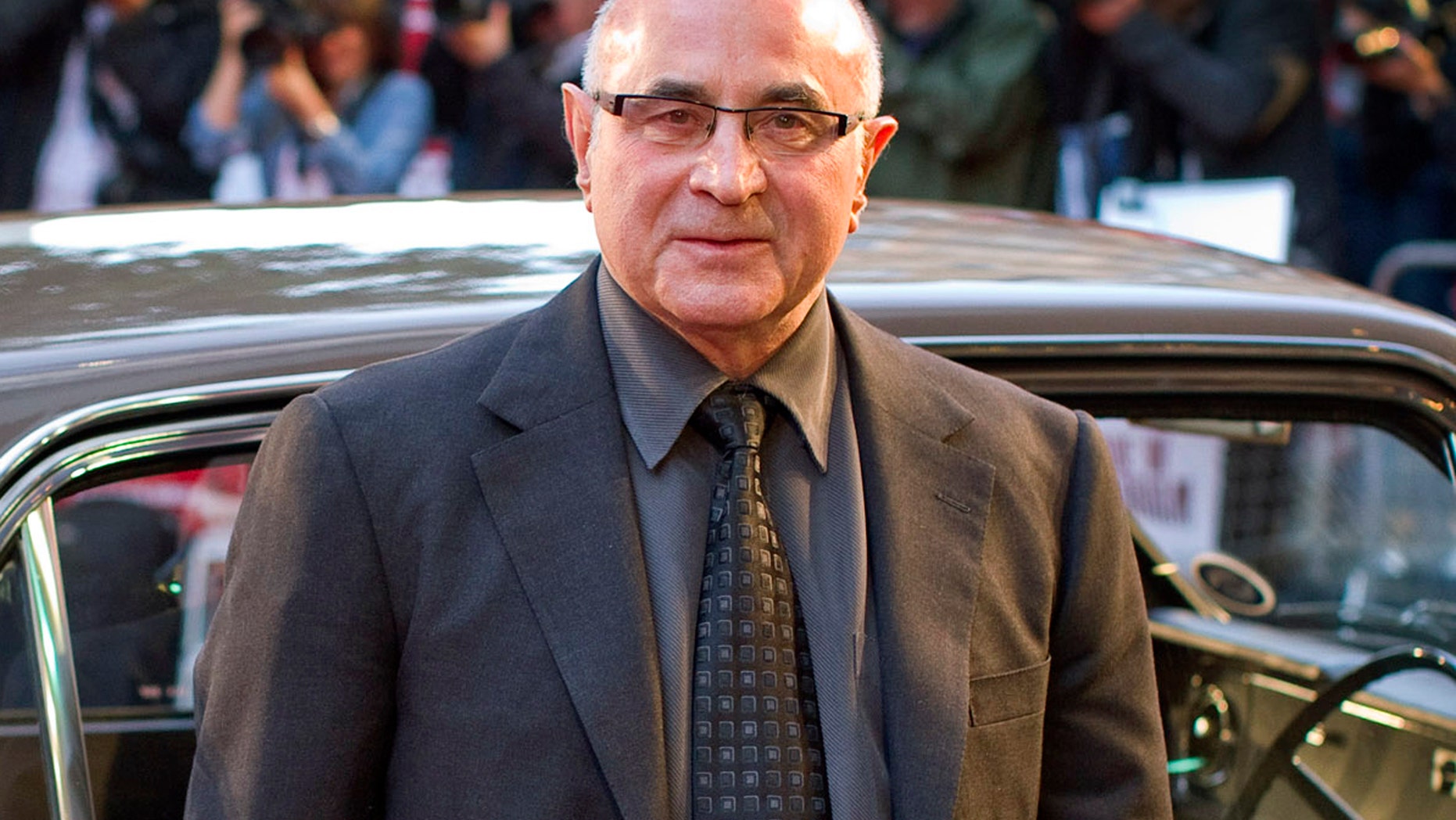 FILE - This Sept. 20, 2010 file photo shows British actor Bob Hoskins arriving for the World Premiere of "Made in Dagenham" in London. Bob Hoskins, whose varied career ranged from "Mona Lisa" to "Who Framed Roger Rabbit?" has died aged 71. A family statement released Wednesday by agent Clair Dobbs said Hoskins died in a hospital after a bout of pneumonia. In 2012 Hoskins announced that he had been diagnosed with Parkinson's disease and was retiring from acting. (AP Photo/Joel Ryan, file)